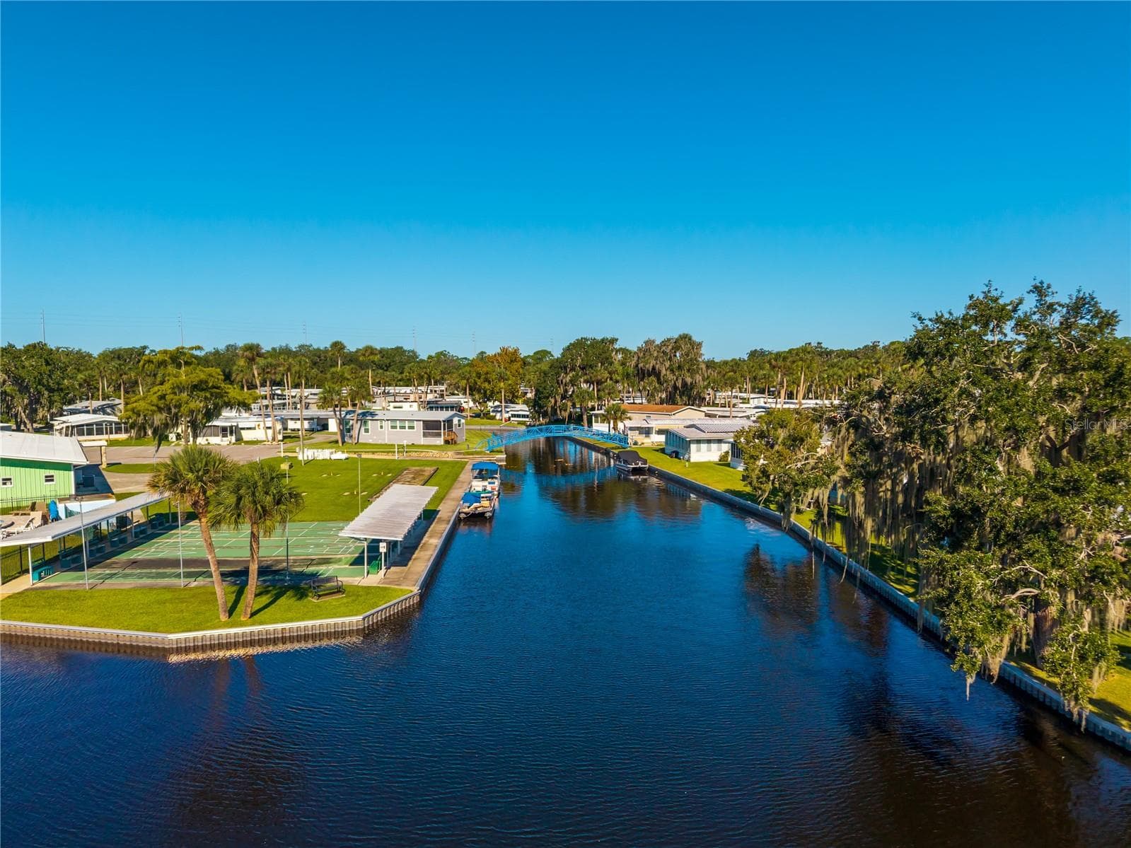 Aerial View of Clubhouse Area with Canal Access - 130 PINEY RDG, EUSTIS