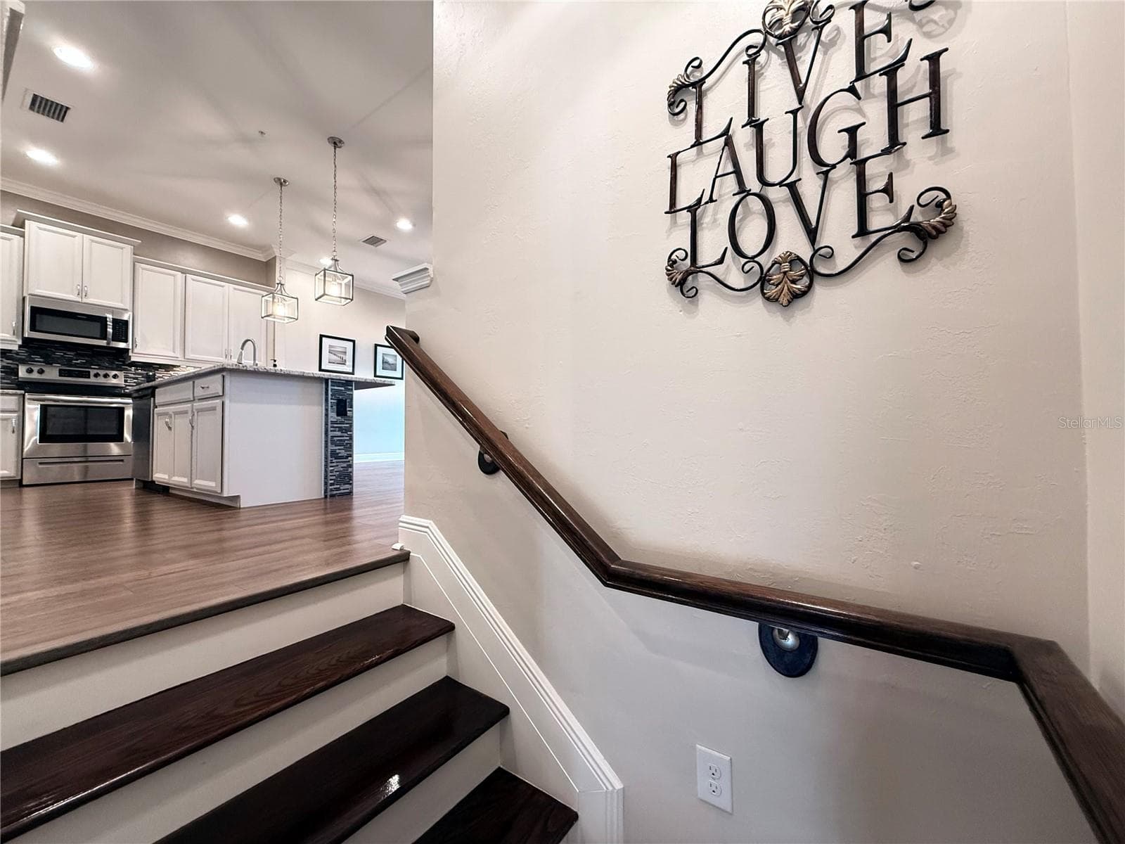 Let's go up to the second floor from the stairs! - 10320 LANDS END CIR #47, PLACIDA