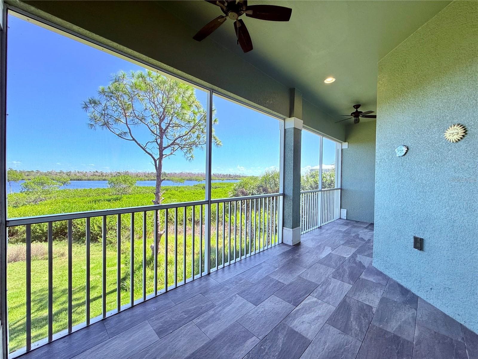 2nd floor balcony with tiled flooring! - 10320 LANDS END CIR #47, PLACIDA