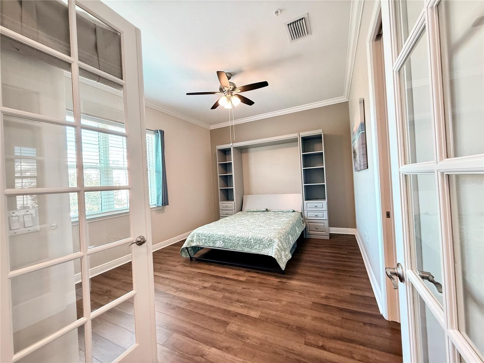 French doors into the primary suite #1 - 10320 LANDS END CIR #47, PLACIDA