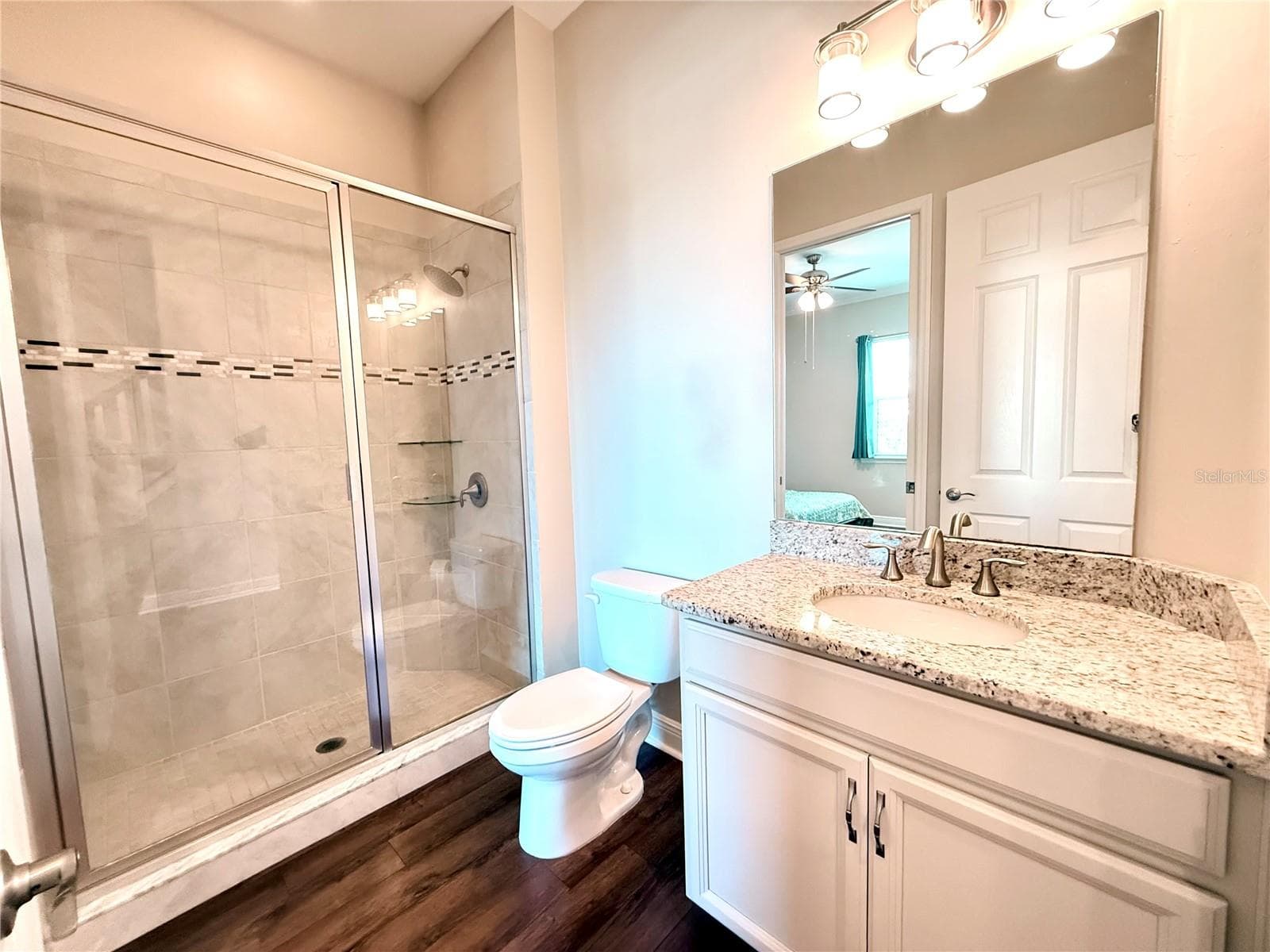 en-suite bathroom with granite countertops - 10320 LANDS END CIR #47, PLACIDA
