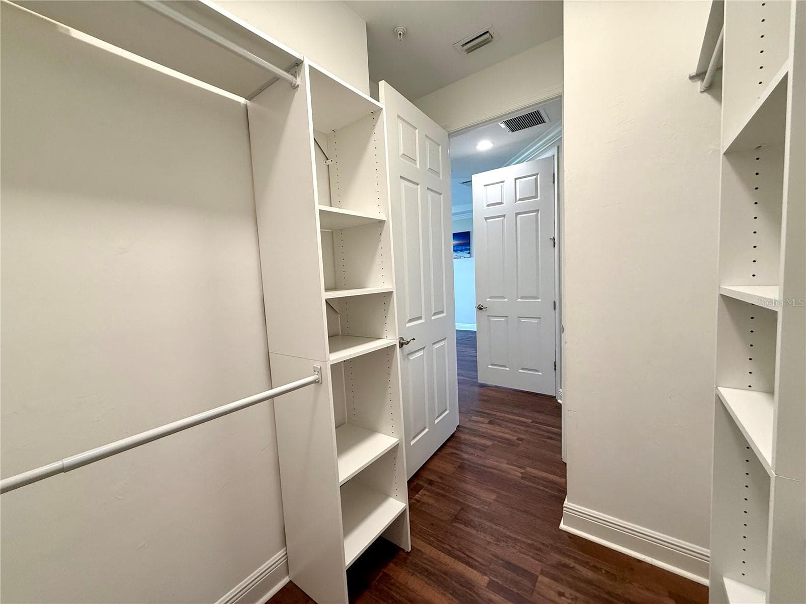 Walk-in closet in primary bedroom #2 - 10320 LANDS END CIR #47, PLACIDA