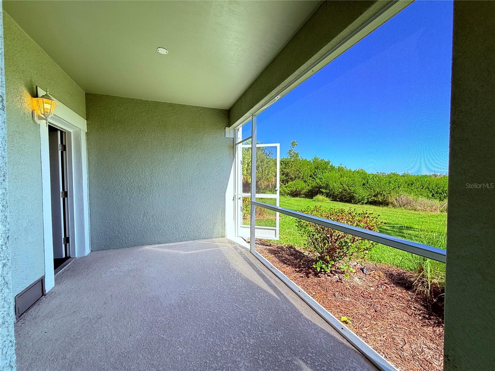 Garage level patio - 10320 LANDS END CIR #47, PLACIDA