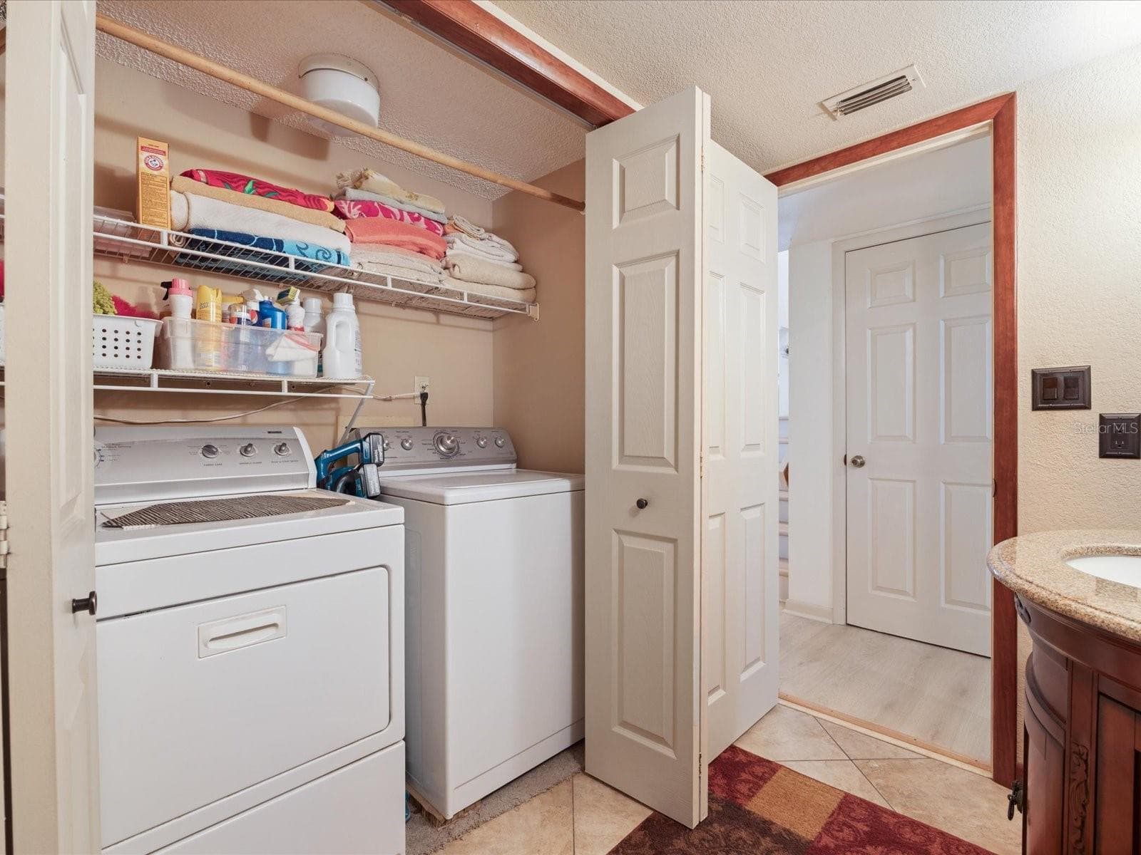 Laundry Closet - 3328 BRIARWOOD CIR, SAFETY HARBOR