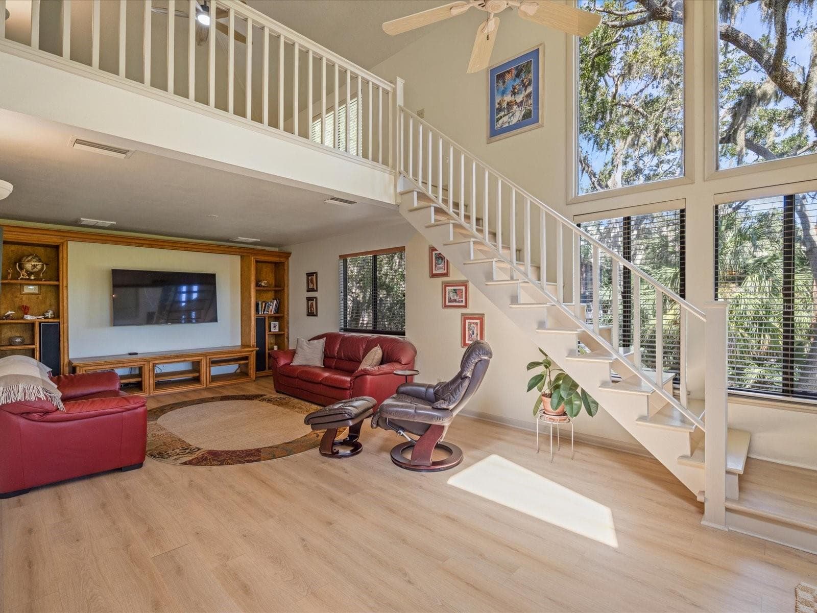 Stairs to Loft/Bonus Room from Family Room - 3328 BRIARWOOD CIR, SAFETY HARBOR
