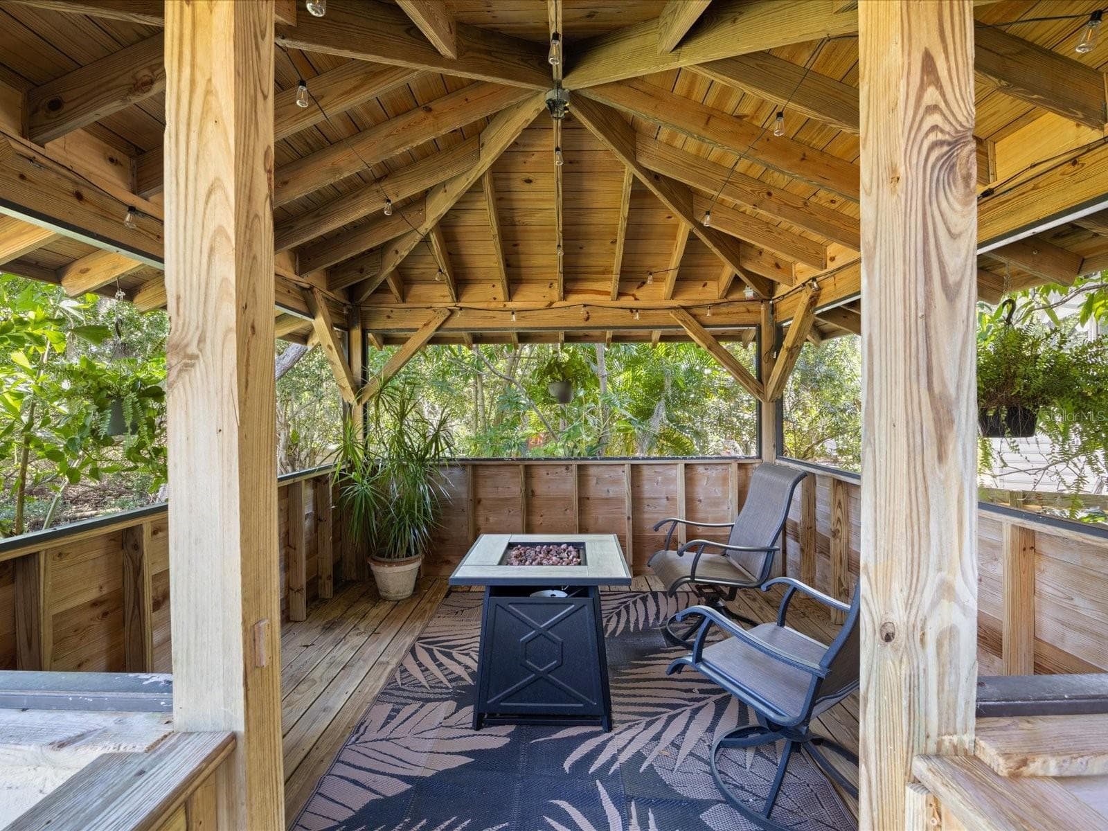The Custom Gazebo complete with a firepit for ambience and cool evenings - 3328 BRIARWOOD CIR, SAFETY HARBOR
