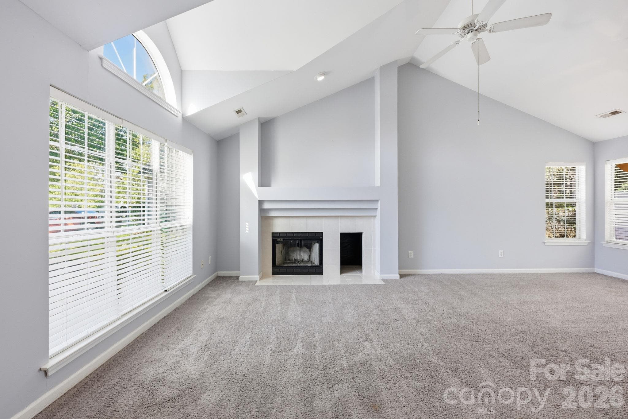 Another view of the Living Room with its wood-burning fireplace! - 4000 Huntmeadow Drive, Charlotte
