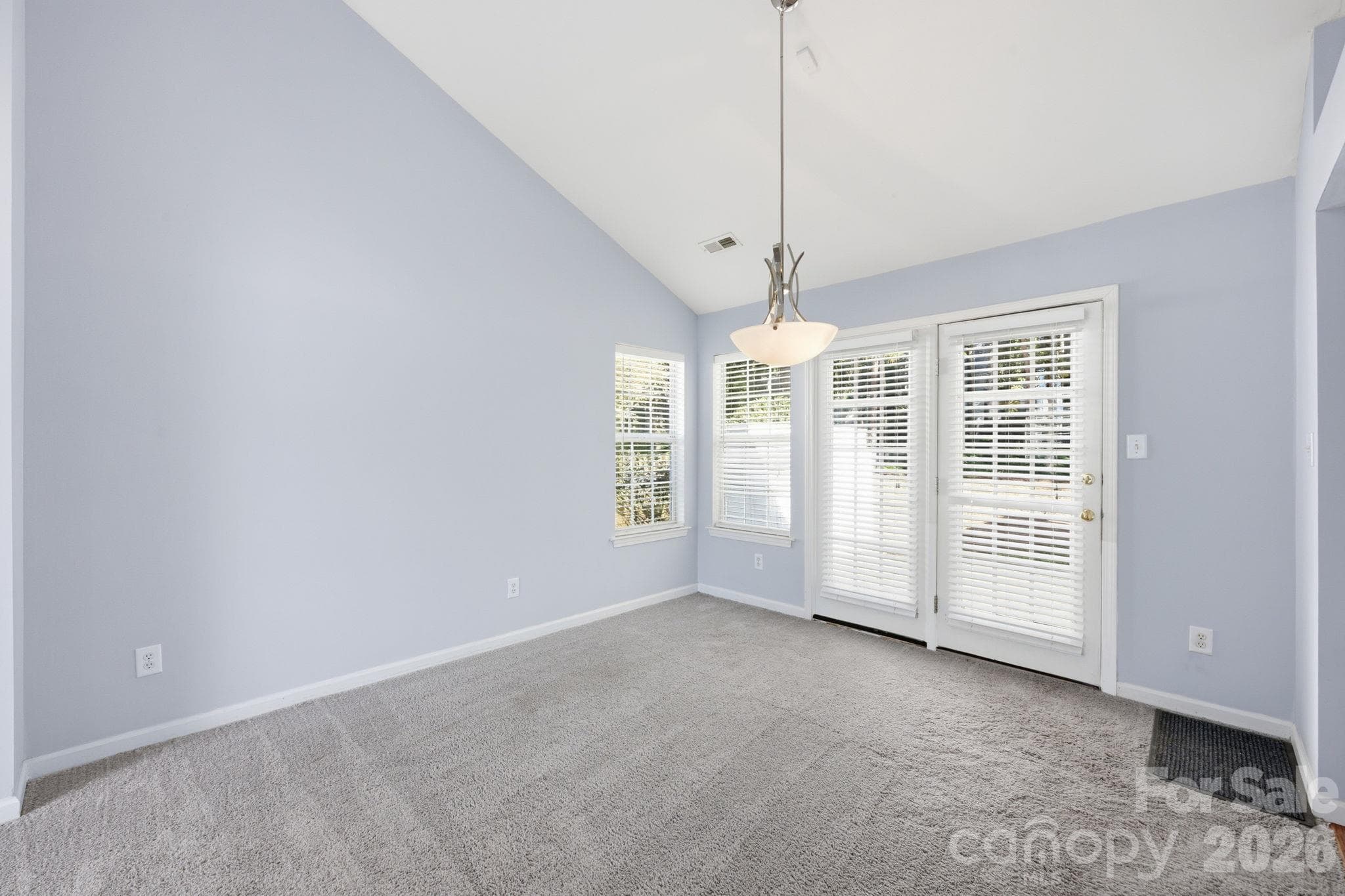 When entertaining, step right outside to your patio from the Dining Room! - 4000 Huntmeadow Drive, Charlotte