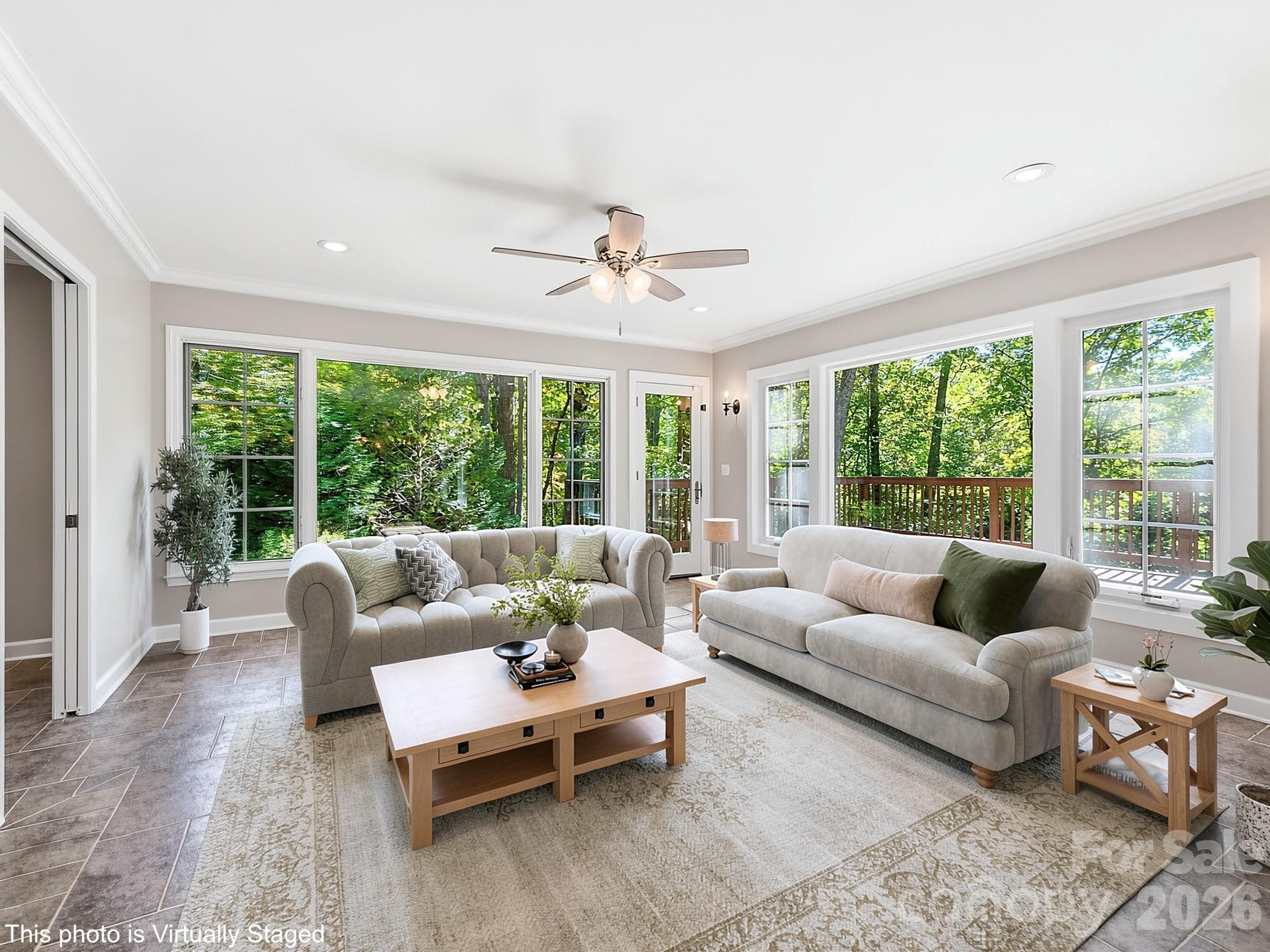 Family Room area with a door leading out to the deck. Virtually staged. - 175 Mimosa Road, Columbus