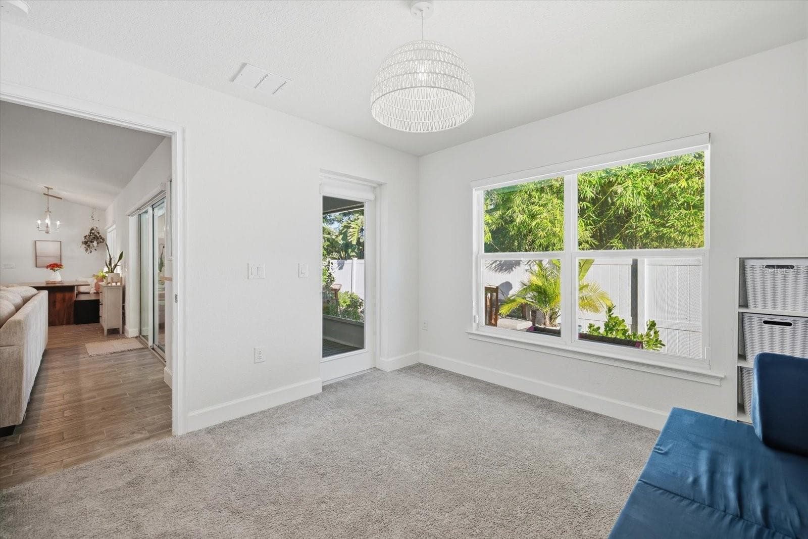 Bedroom 4 with separate access to the lanai. - 300 FORDHAM RD, VENICE