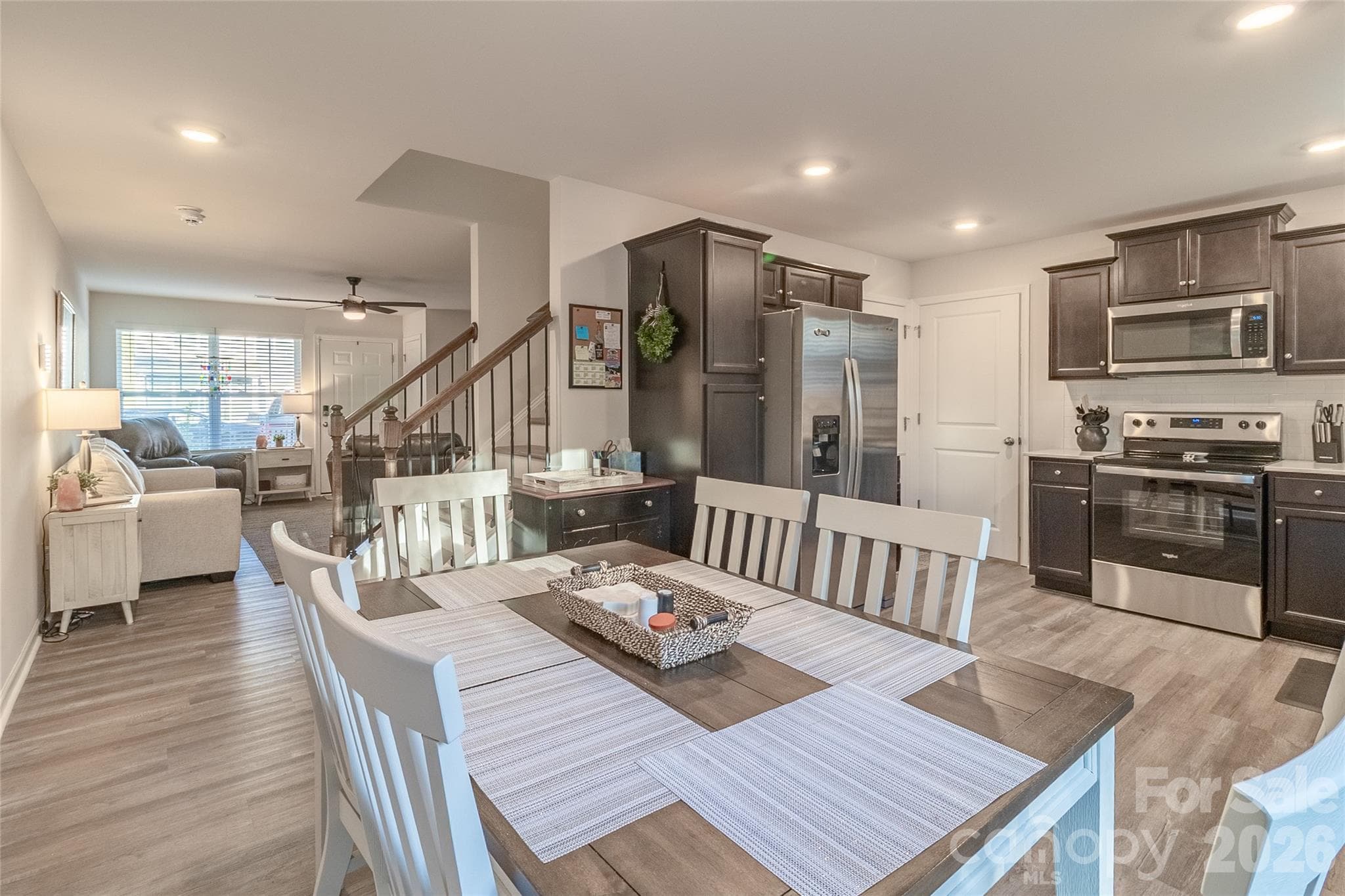 Open concept from kitchen to dining to living room. - 34 Cain Hollow Way, Asheville