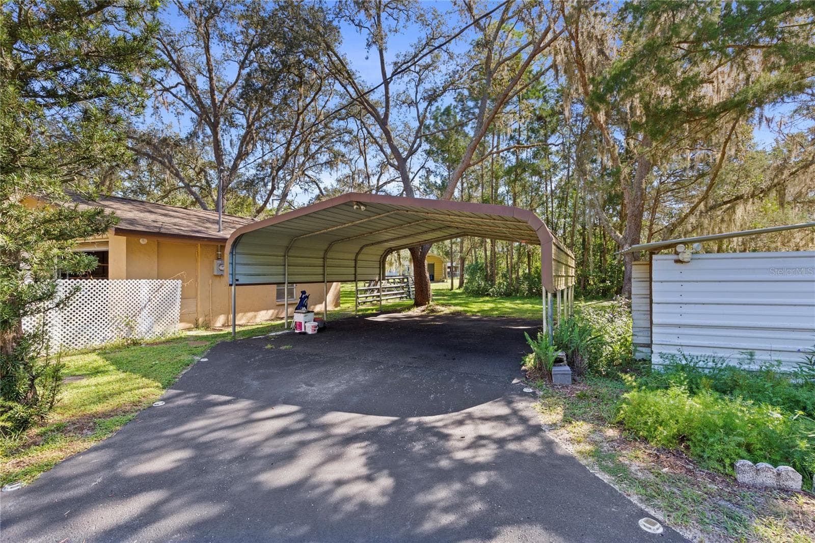 Carport - 10179 FRIERSON LAKE DR, HUDSON