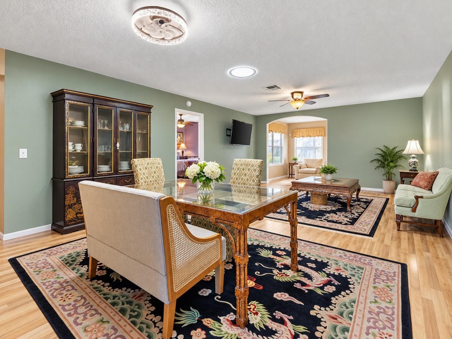 Some of the furniture removed from the room virtually staged - 2022 CRISTO RD, THE VILLAGES