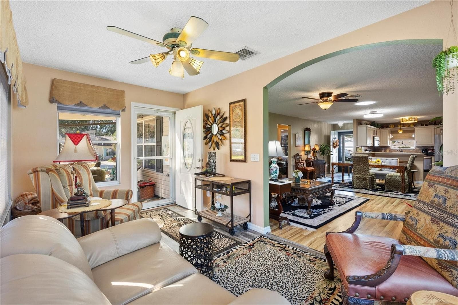 View to home from the enclosed Florida room - 2022 CRISTO RD, THE VILLAGES
