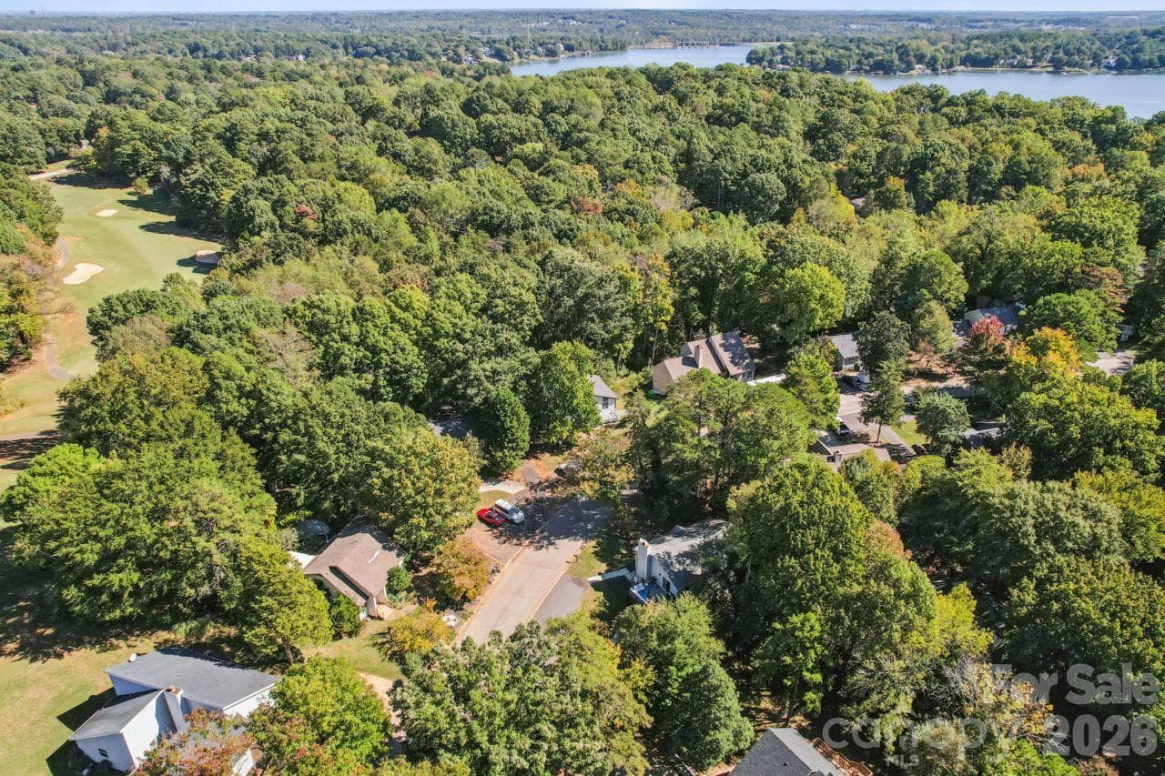 Aerial view of property near beside Lake Wylie and Tega Cay Golf Course - 3106 Point Clear Drive, Tega Cay