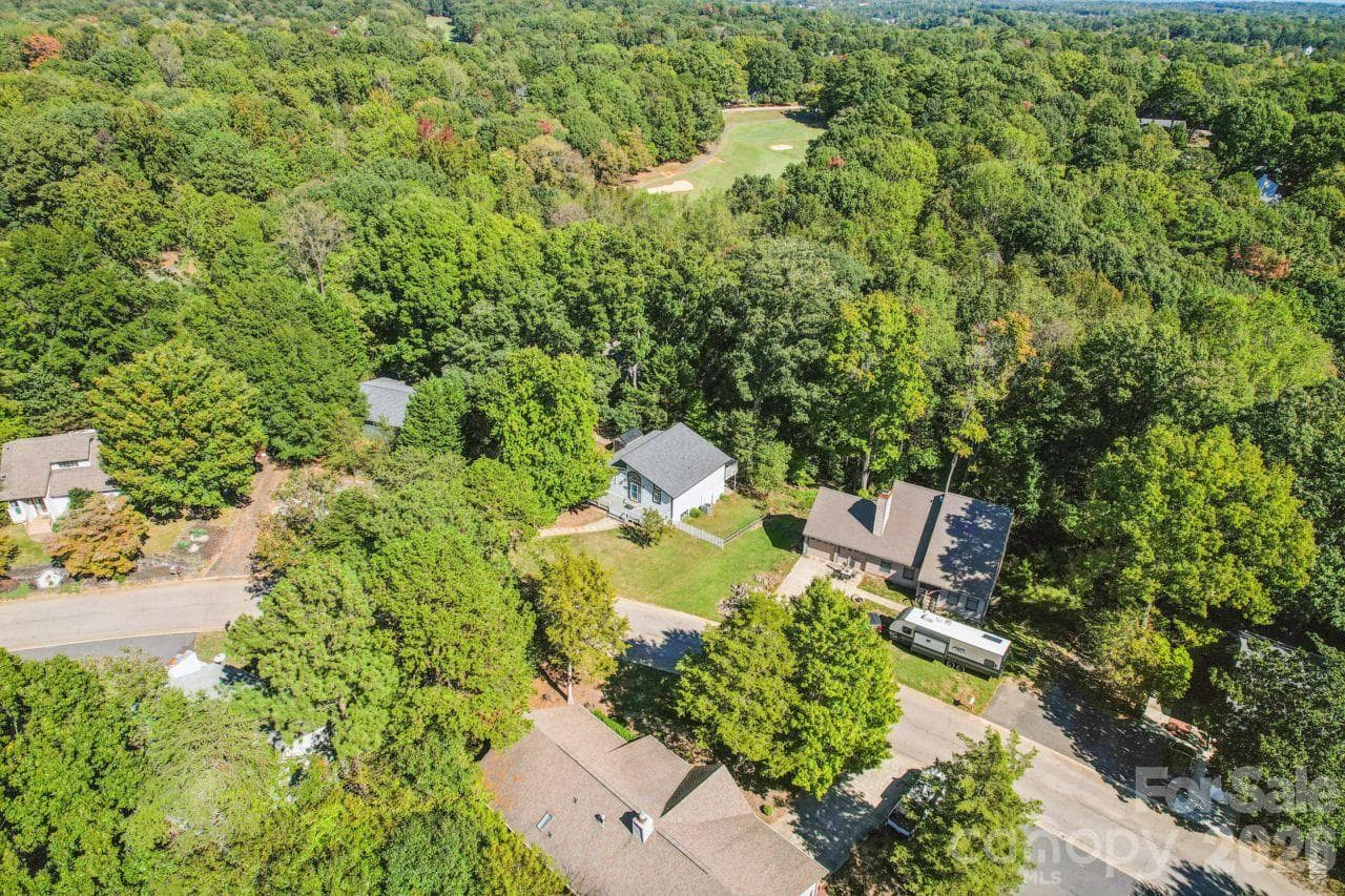 Aerial view of home with golf course in the back - 3106 Point Clear Drive, Tega Cay