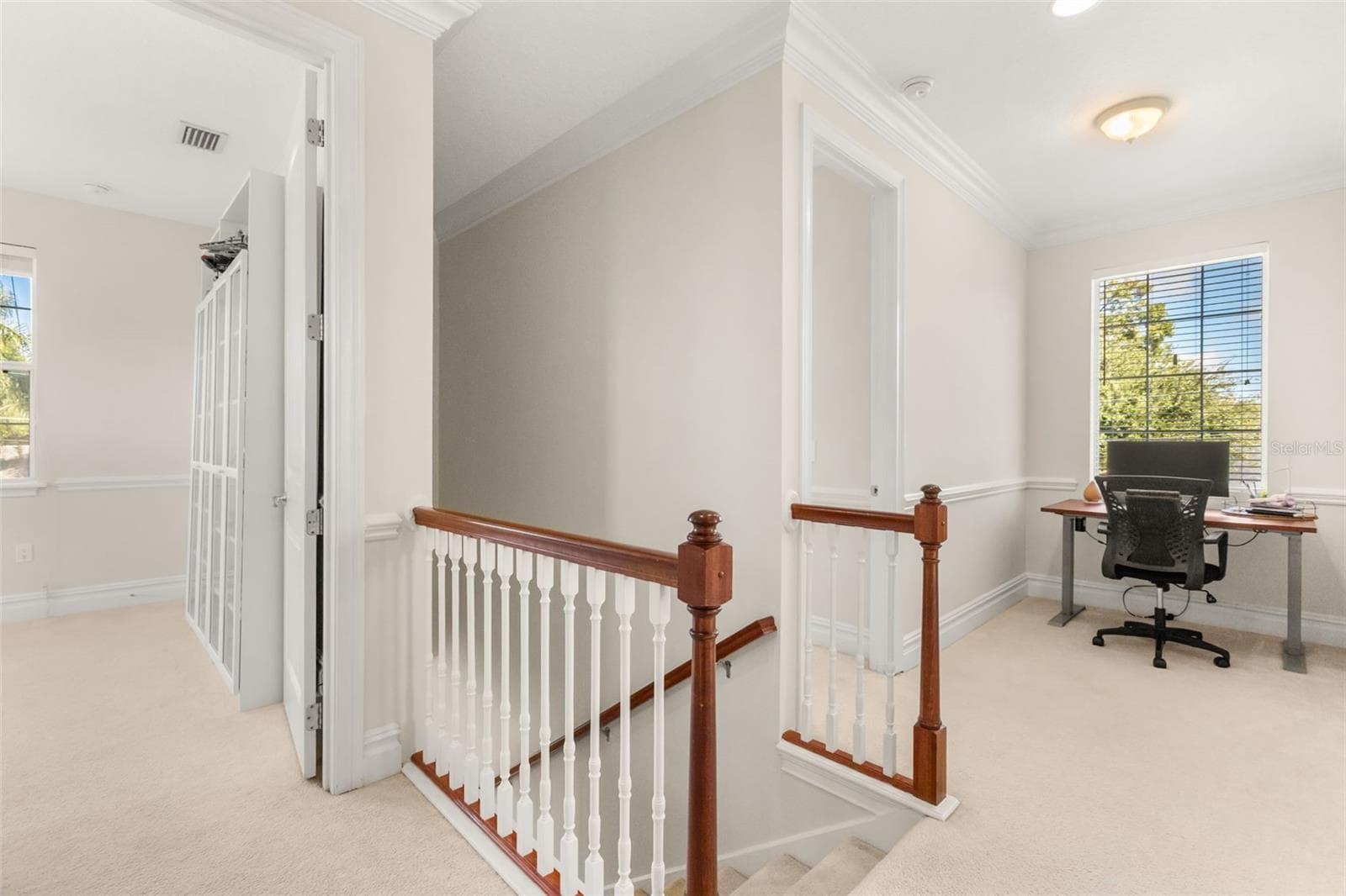 Upstairs features what is currently being used as an additional work from home space. - 947 N SHINE AVE, ORLANDO