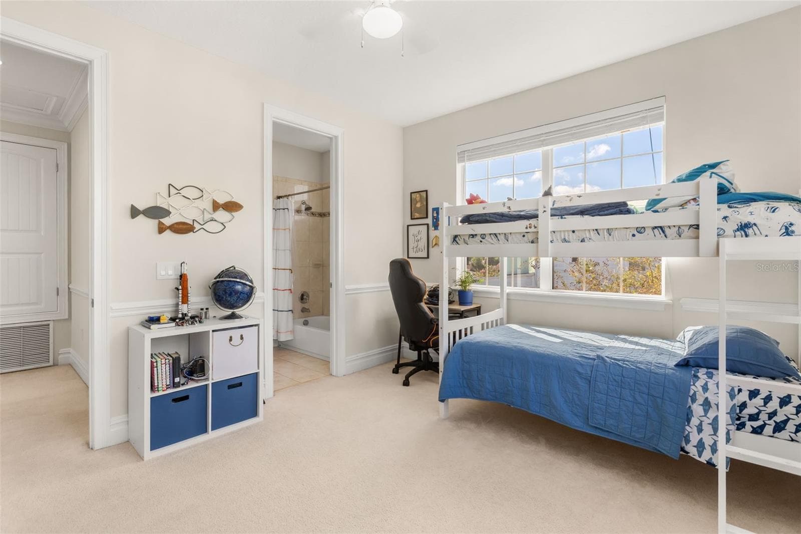 Bedroom 2 features an en suite bath also accessible from main hallway. - 947 N SHINE AVE, ORLANDO