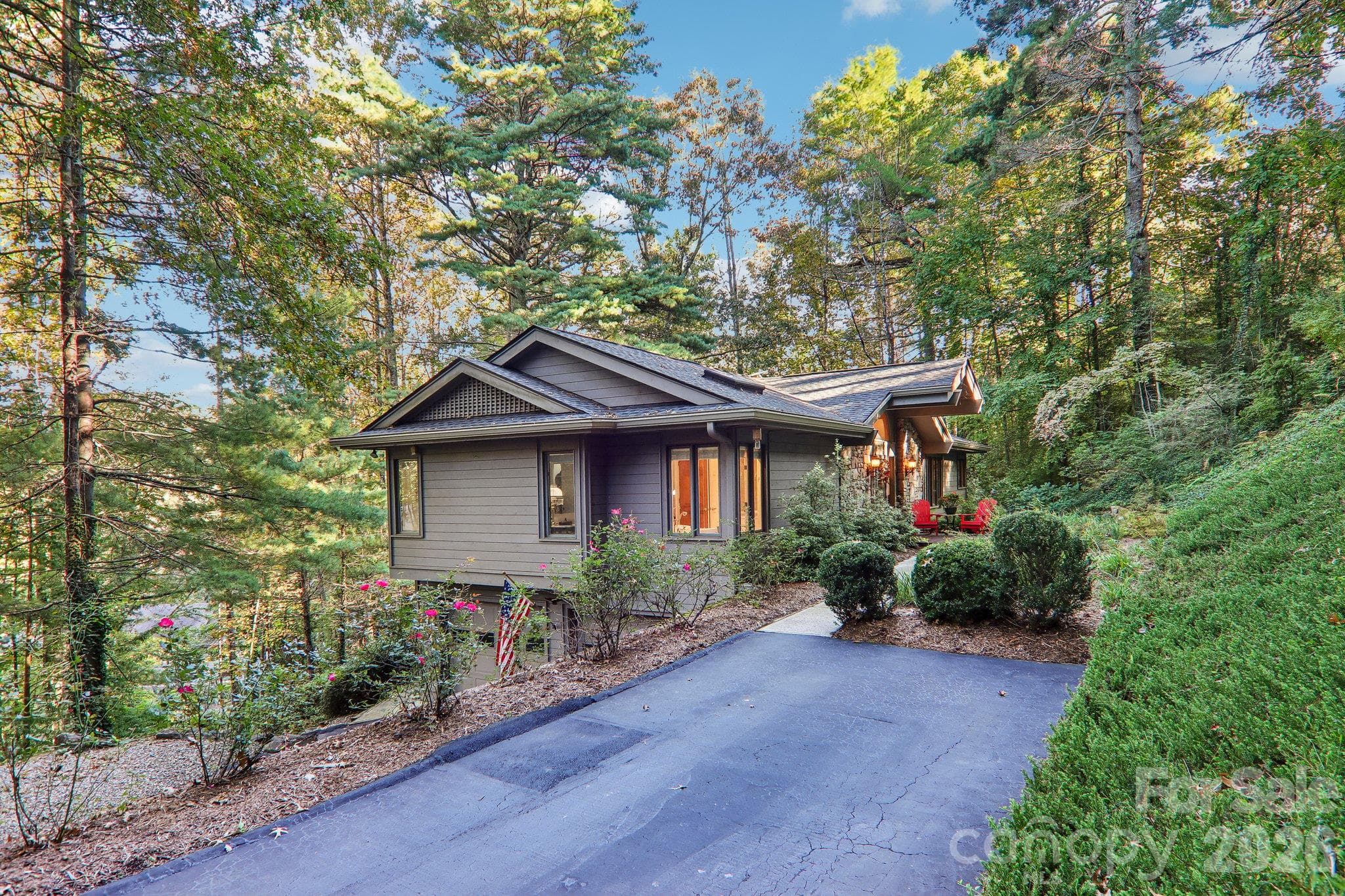 Side of home from the upper driveway - 212 Pheasant Run, Hendersonville