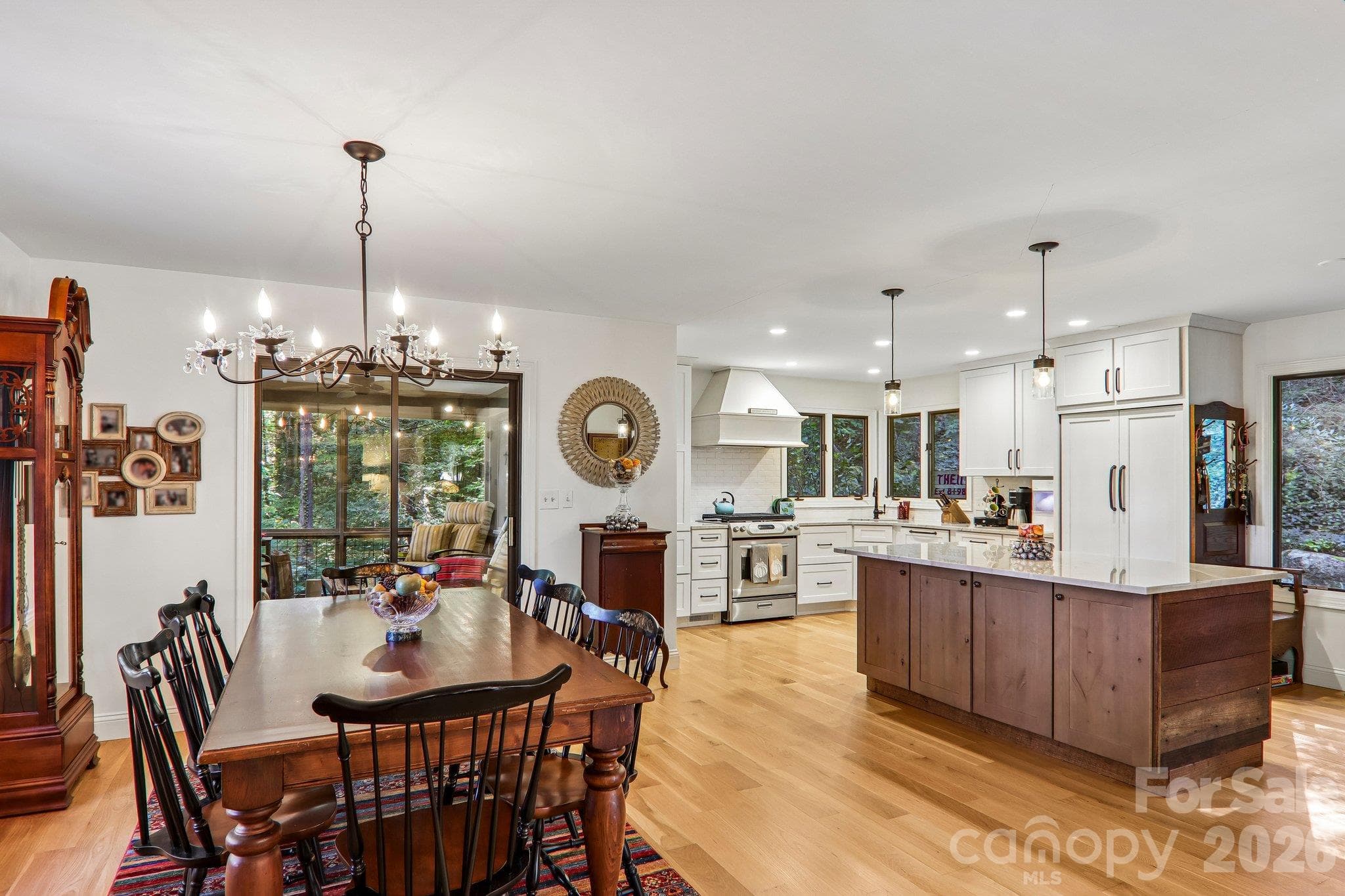 Open concept dining and kitchen makes this a great home for entertaining. - 212 Pheasant Run, Hendersonville