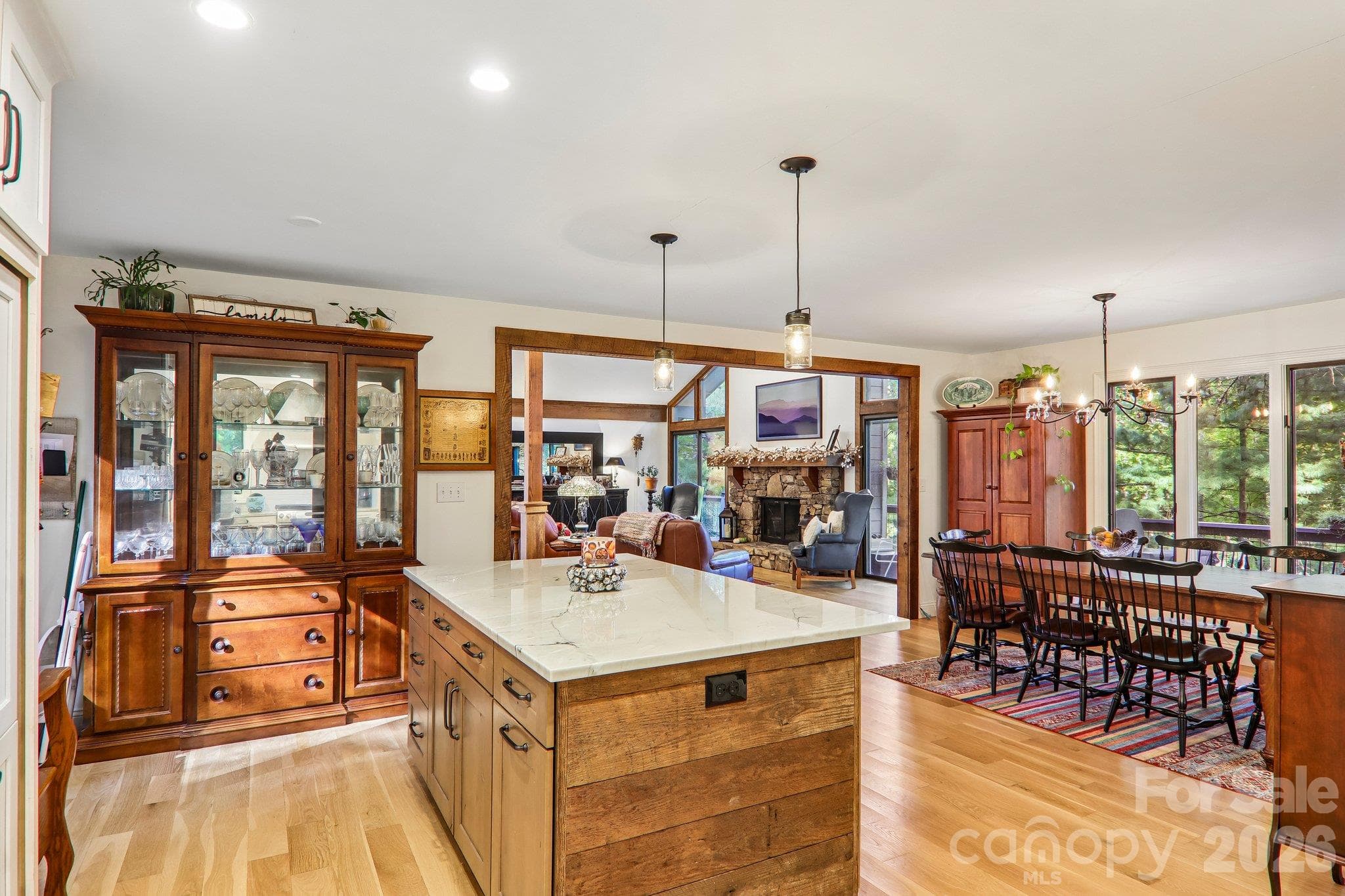 View from the kitchen into the dining and living areas - 212 Pheasant Run, Hendersonville
