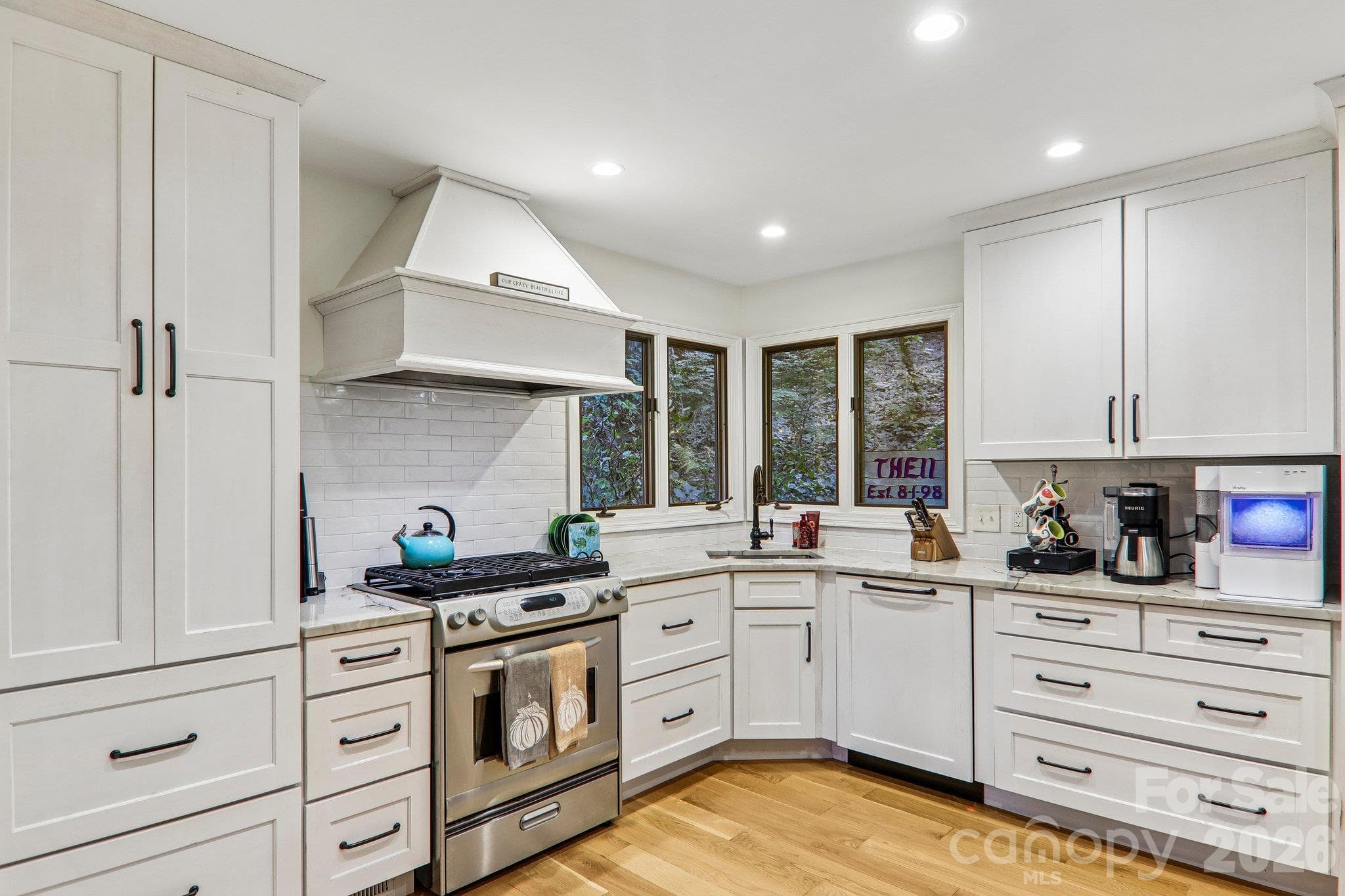 Kitchen cabinetry and many pull outs and drawers for easy access. - 212 Pheasant Run, Hendersonville