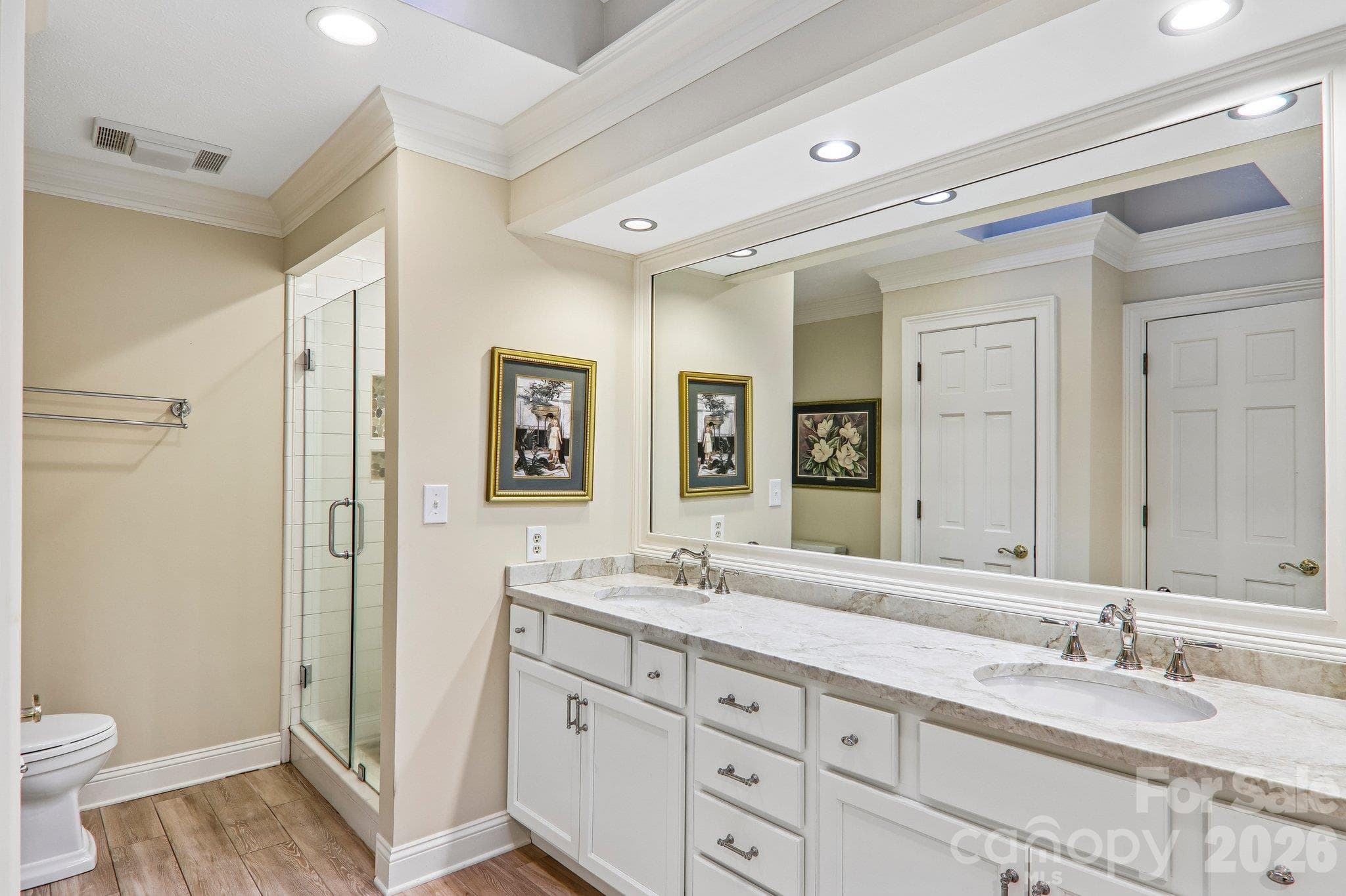Primary Ensuite with double sinks stand up shower and soaking tub. - 212 Pheasant Run, Hendersonville
