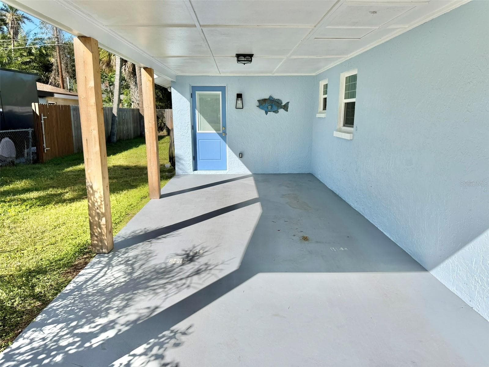 Covered Carport with Mudroom Entry - 336 SHADDOCK ST, TARPON SPRINGS