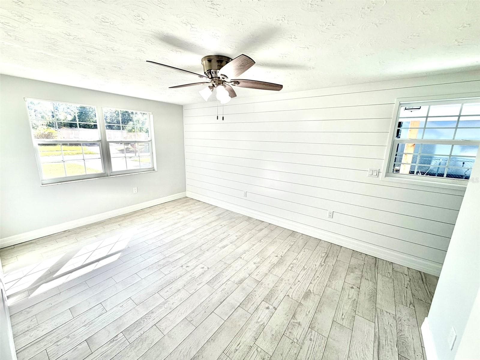 Primary Bedroom has lots of Natural Light! - 336 SHADDOCK ST, TARPON SPRINGS