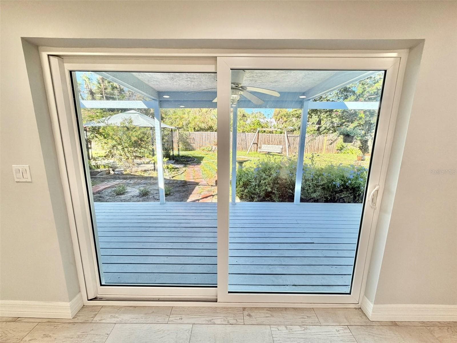 New Sliding Doors to the Covered Deck and Big Back yard - 336 SHADDOCK ST, TARPON SPRINGS