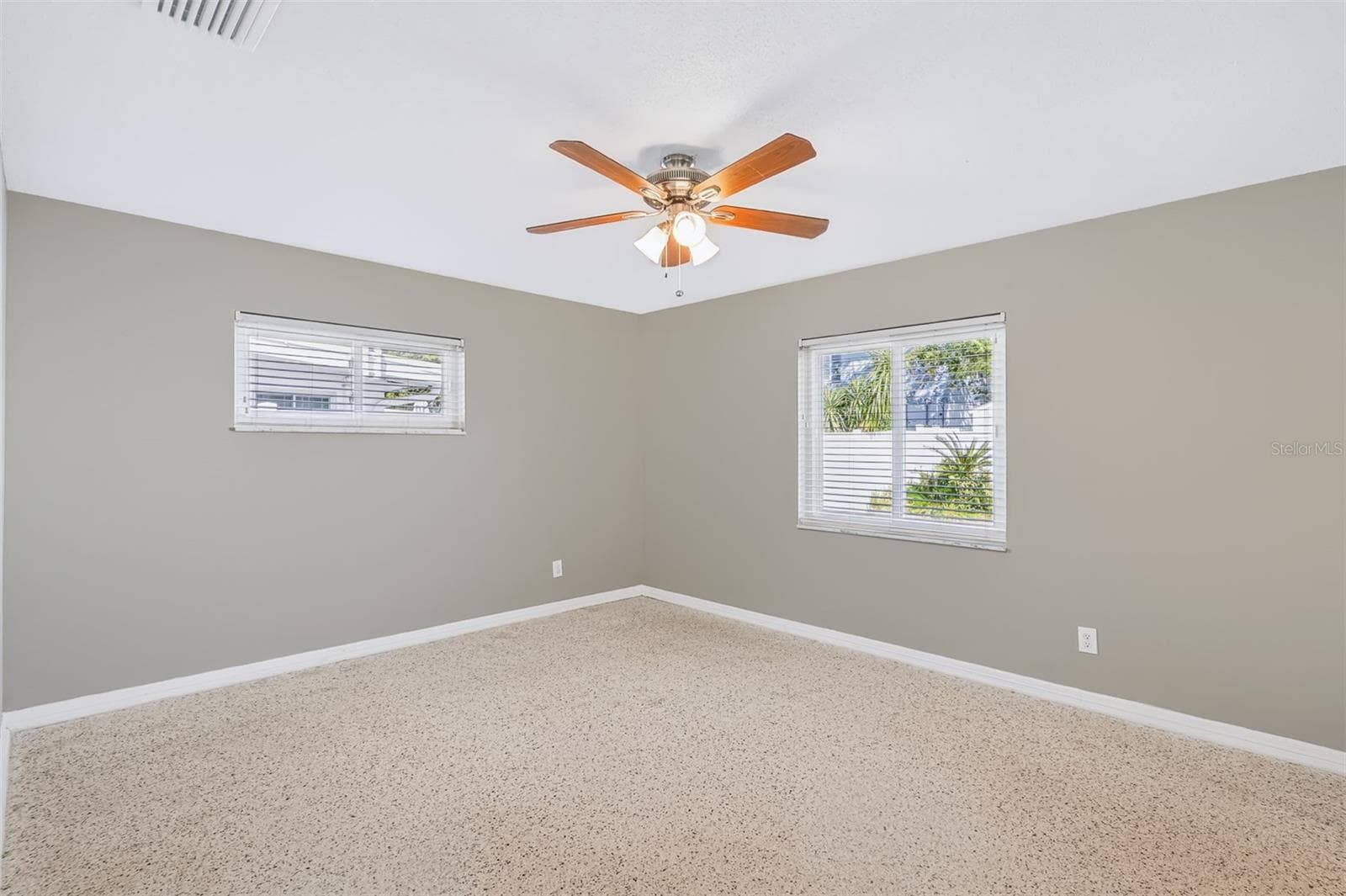 Primary Bedroom with Great Natural Light and Wonderful Terrazo Floors - 624 DUNRAVEN DR, WINTER PARK