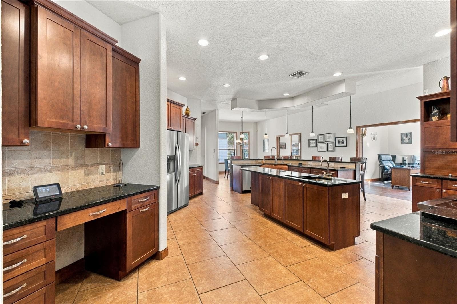 KITCHEN WITH LARGE ISLAND - 10484 GYPSY AVE, WEEKI WACHEE