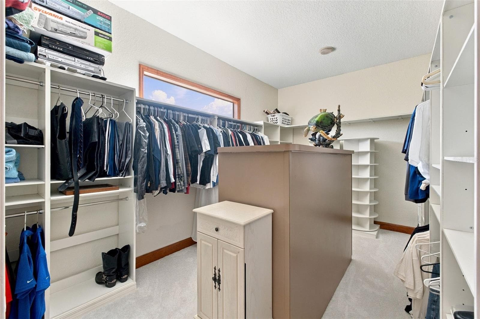 PRIMARY CLOSET - 10484 GYPSY AVE, WEEKI WACHEE