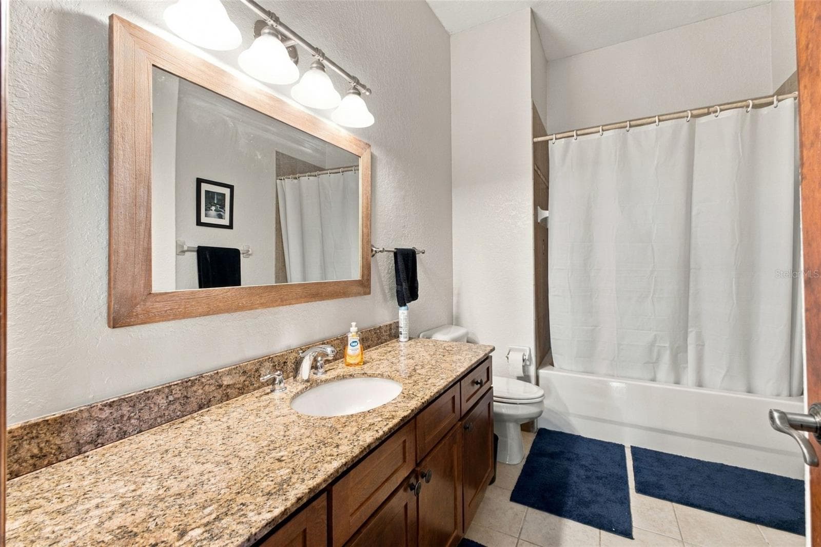 UPSTAIRS GUEST BATHROOM - 10484 GYPSY AVE, WEEKI WACHEE