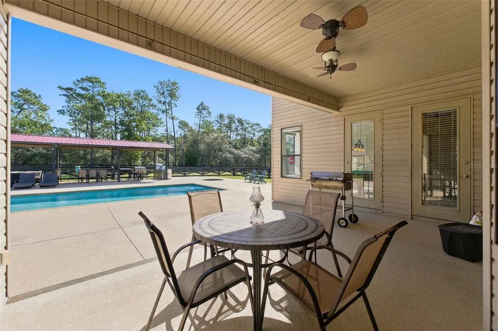 COVERED LANAI - 10484 GYPSY AVE, WEEKI WACHEE