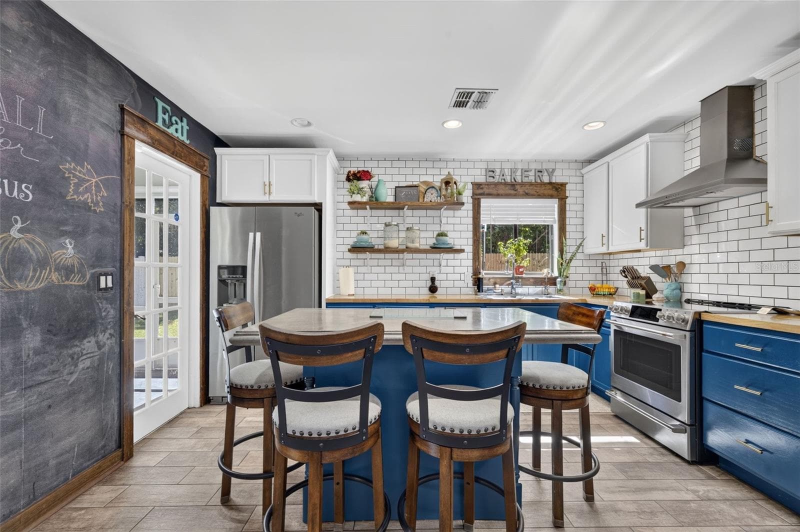 Kitchen with back porch access - 7808 WINTER SONG DR, ORLANDO