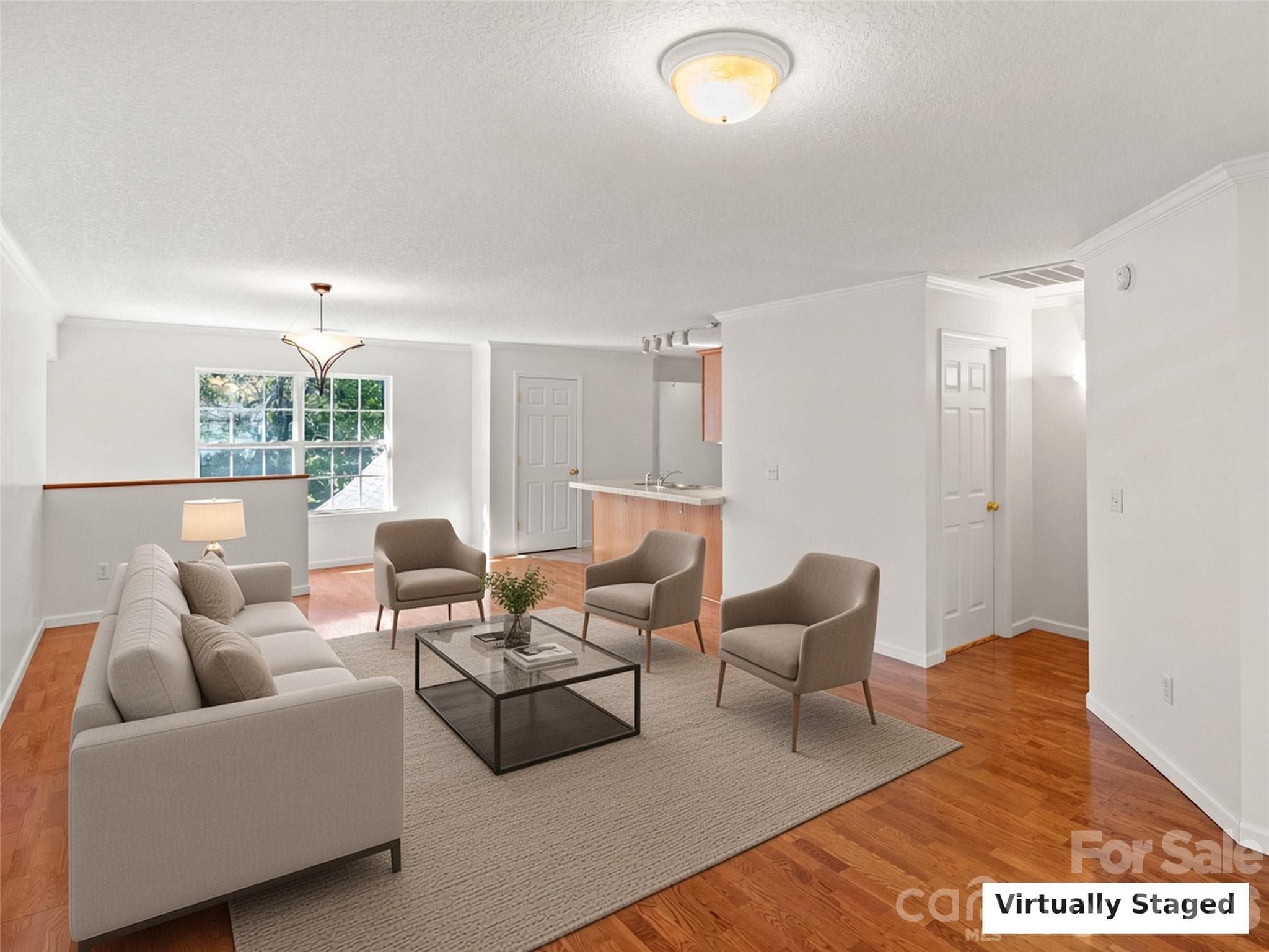 Virtually Staged. Open living room flowing to the kitchen. - 206 Waters Edge Drive, Weaverville