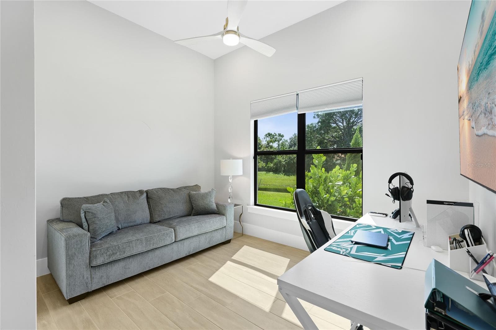 Bedroom 3 with ceiling fan, built-in closet with lighting. - 14726 EAGLE BRANCH DR, NOKOMIS