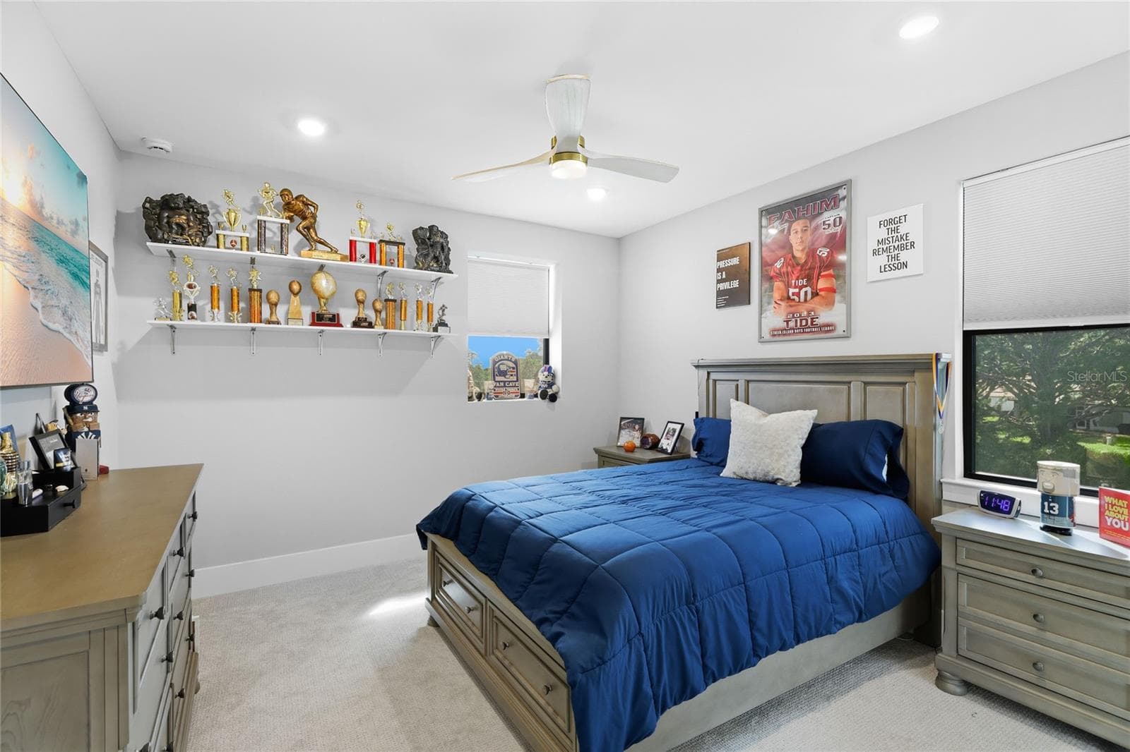 Bedroom 5 with ceiling fan and built in closet. Great water view over-looking the side of the home and creek. - 14726 EAGLE BRANCH DR, NOKOMIS