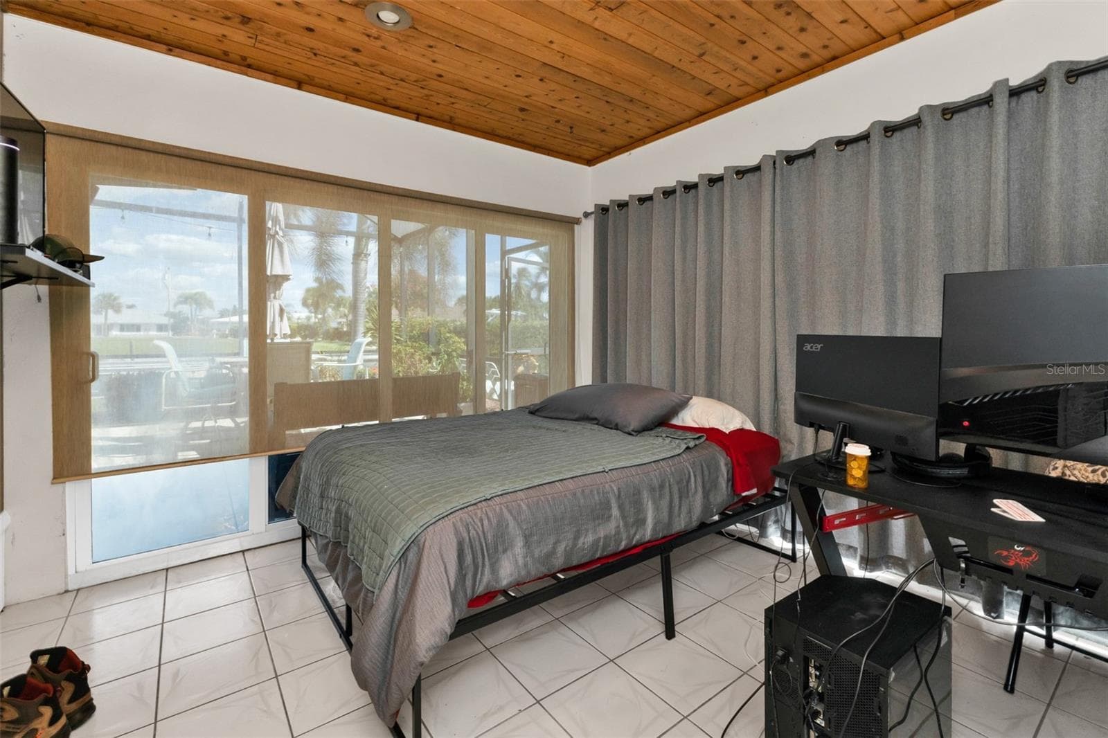 Lanai (partial) used as a bedroom under air - 536 MATARES DR, PUNTA GORDA