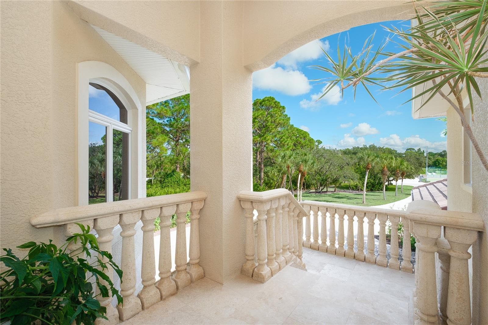 Stunning travertine stairway - 1930 BAYSHORE DR, ENGLEWOOD