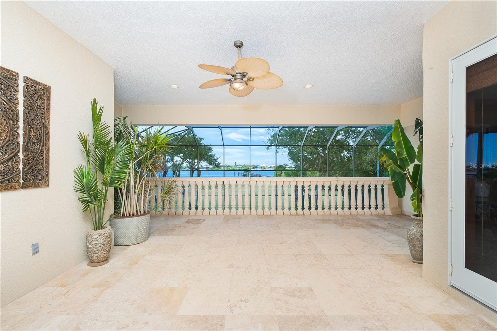 Travertine balcony with stunning views of Lemon Bay - 1930 BAYSHORE DR, ENGLEWOOD