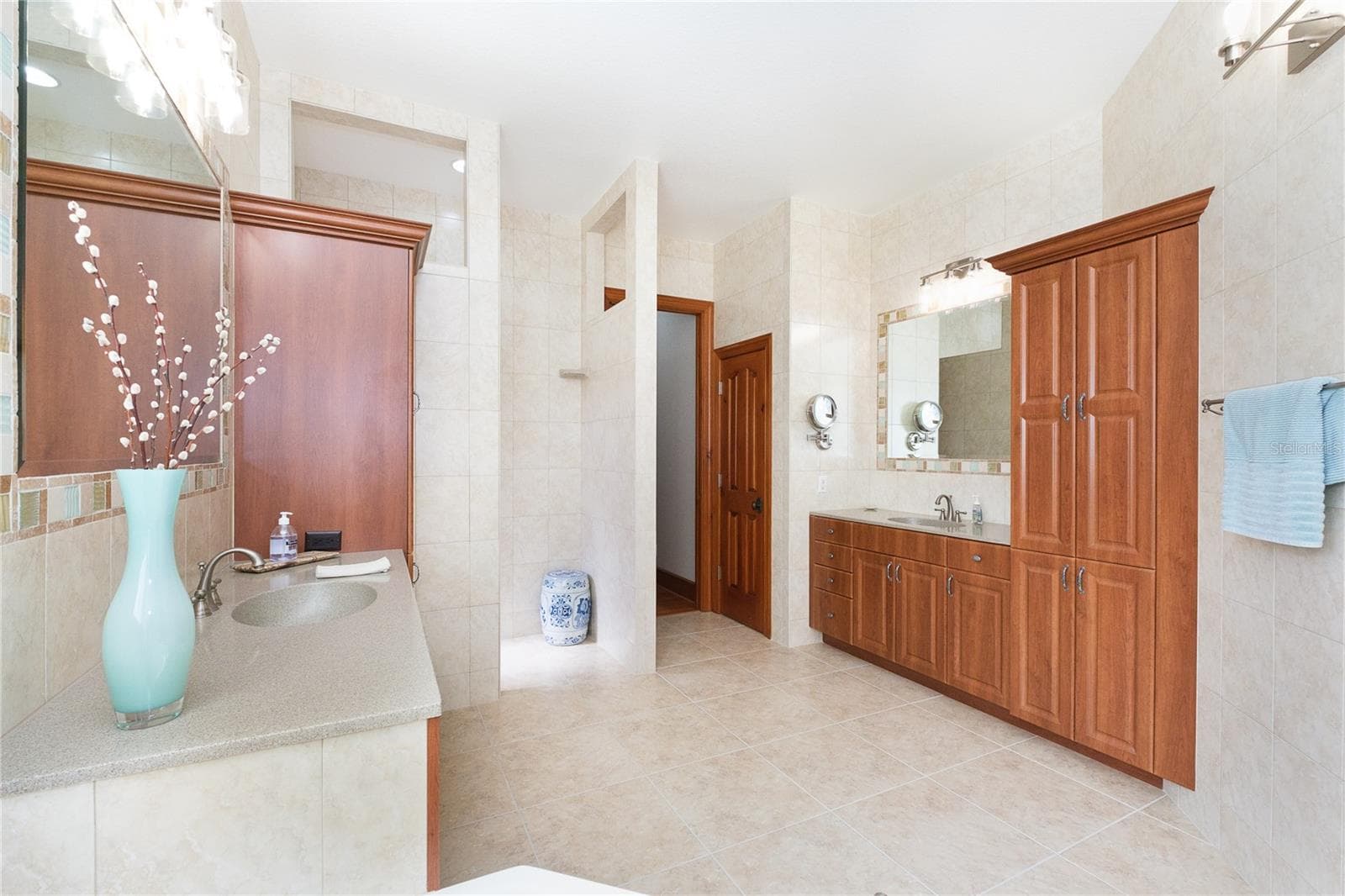 Primary Bath provides plenty of cabinets for storage - 1930 BAYSHORE DR, ENGLEWOOD
