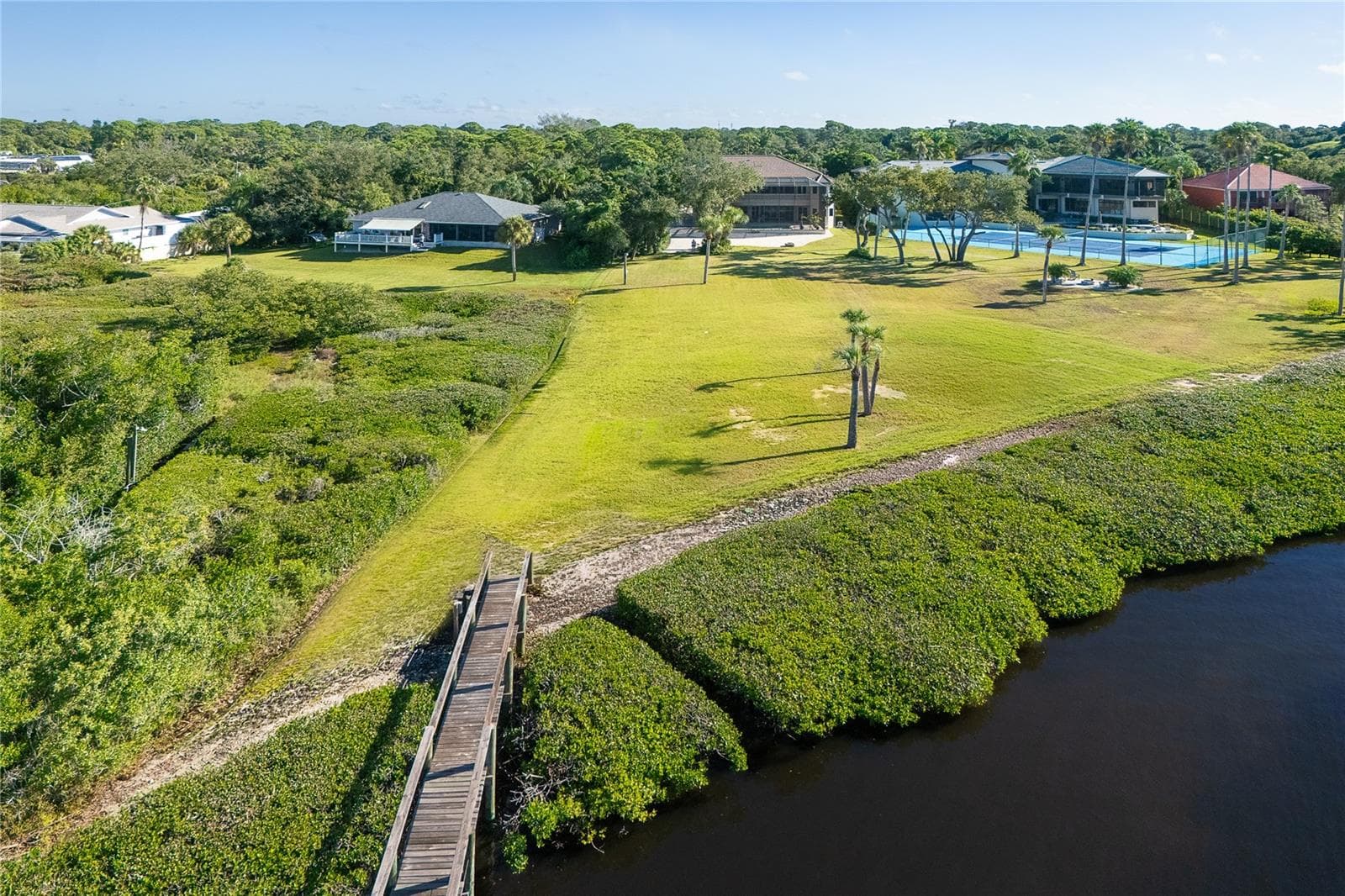 Dock leading to Lemon Bay - 1930 BAYSHORE DR, ENGLEWOOD