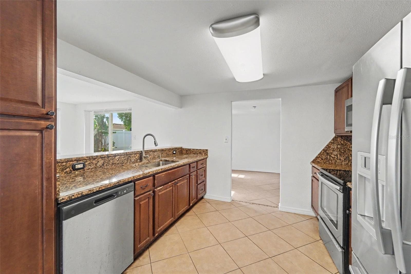 Single Family Residence at 5632 FESTIVO DR, HOLIDAY, photo 12 of 31