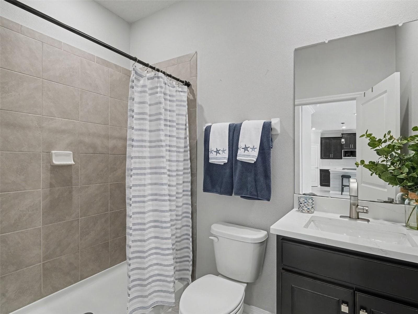 Main floor full bathroom - 5731 WOODLAND SAGE DR, SARASOTA
