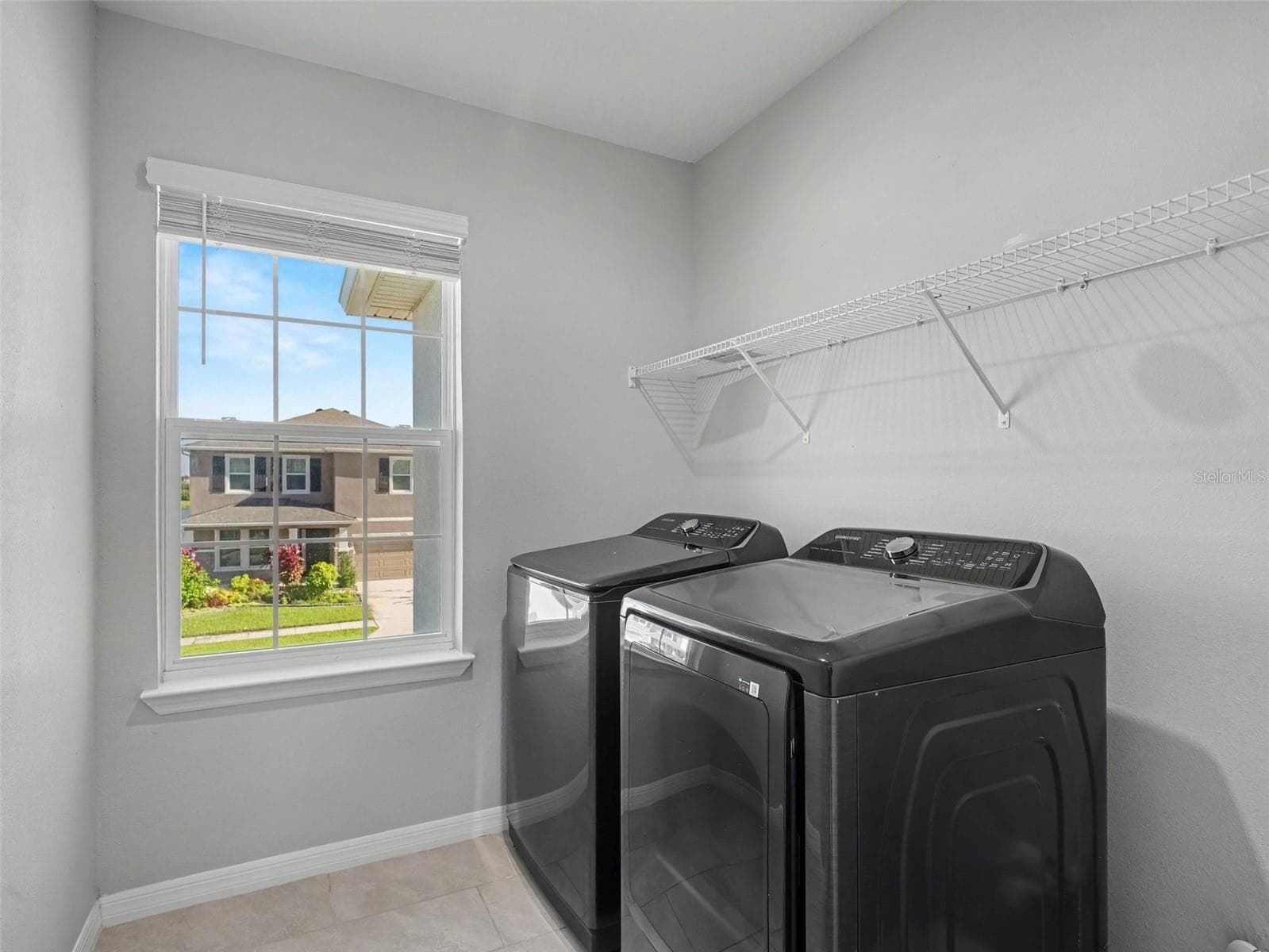 Laundry upstairs - 5731 WOODLAND SAGE DR, SARASOTA