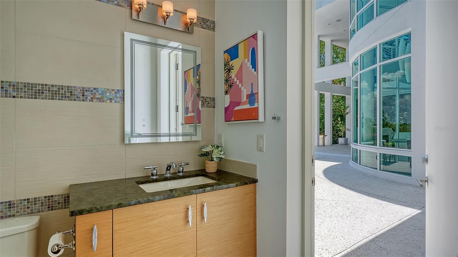 bathroom of the junior suite and pool bathroom - 4317 MIDNIGHT PASS RD, SARASOTA