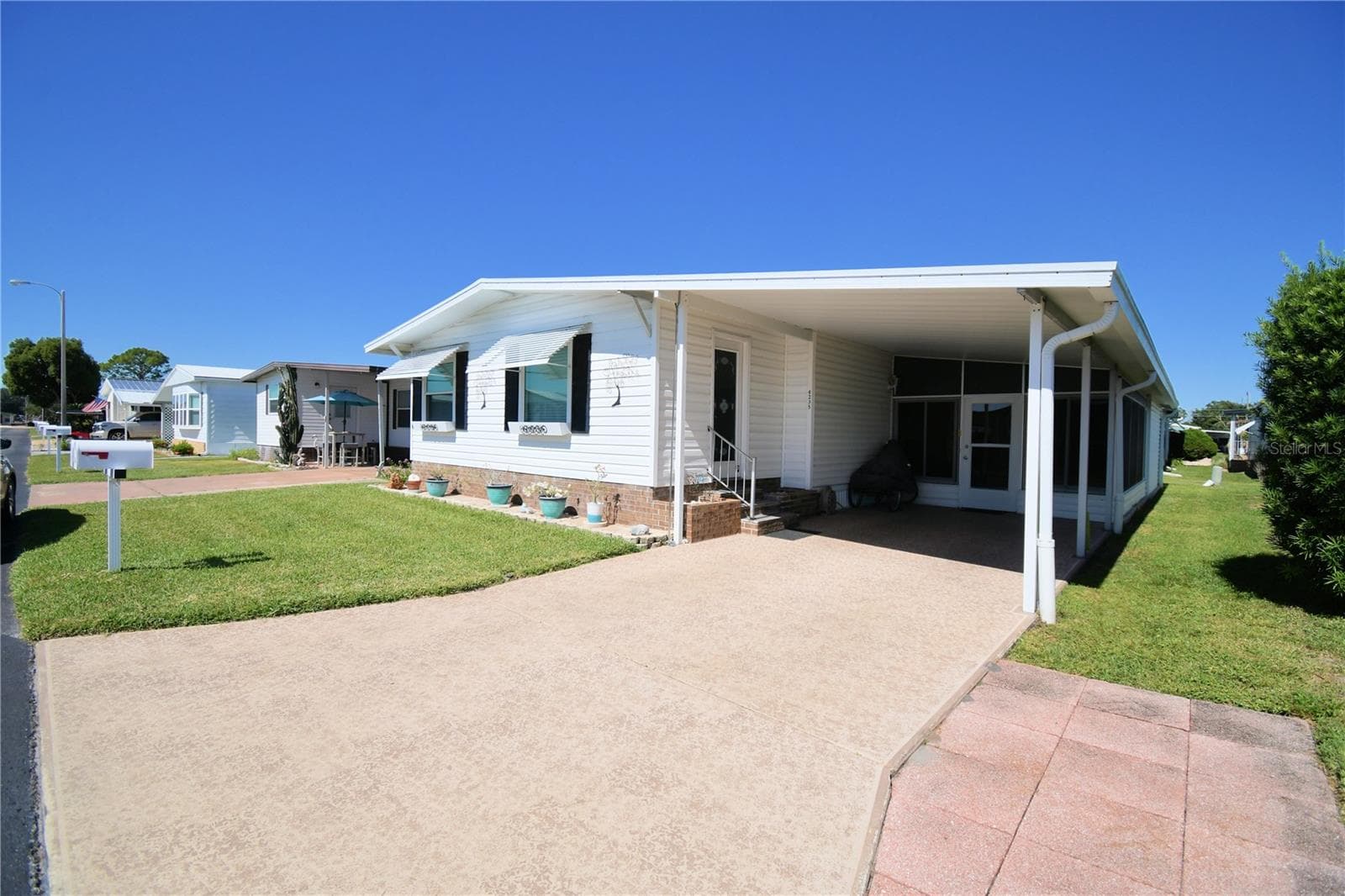 Manufactured Home at 4235 CEDARWOOD ST, WINTER HAVEN, photo 2 of 66