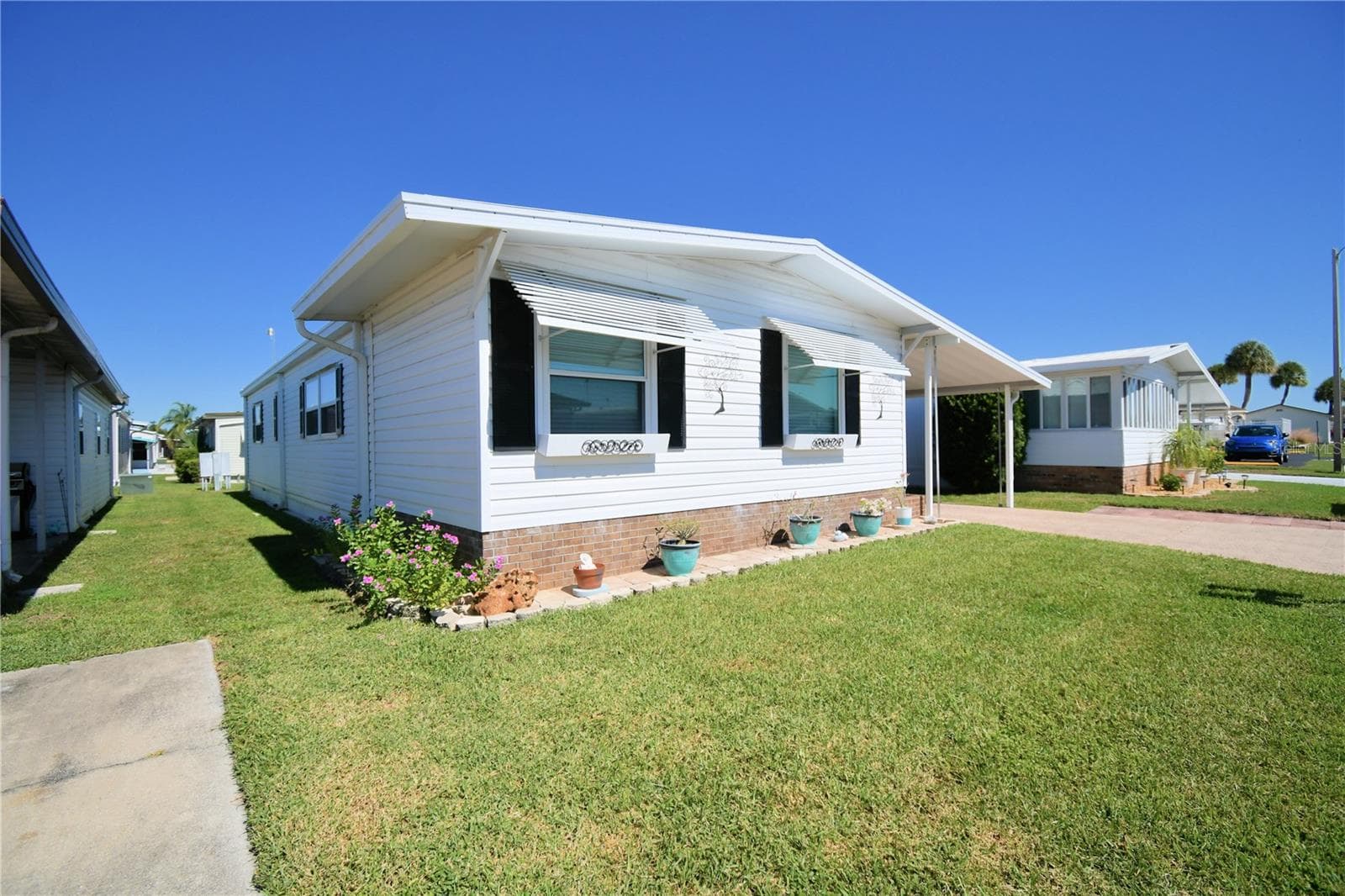 Manufactured Home at 4235 CEDARWOOD ST, WINTER HAVEN, photo 3 of 66